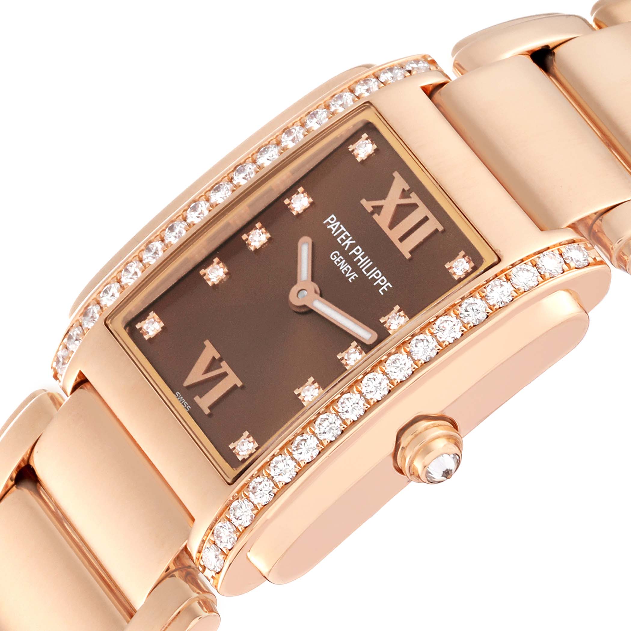The image shows a close-up angle of the Patek Philippe Twenty-4 4910/11 Women's Rose Gold Brown Dial 4910/11 Women's Rose Gold Brown Dial watch, highlighting the face, diamond-studded bezel, and part of the bracelet.