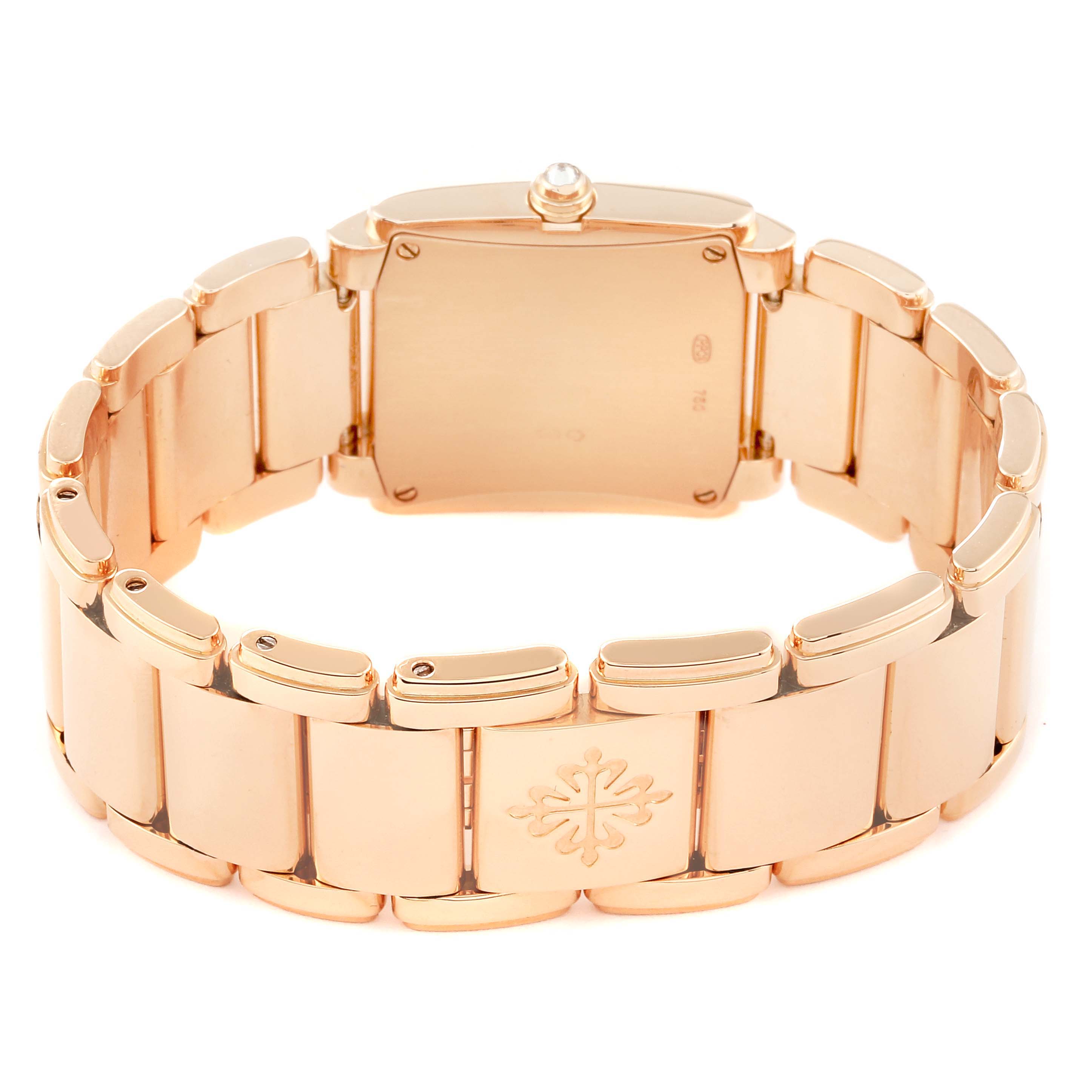 The image shows the back of the Patek Philippe Twenty-4 4910/11 Women's Rose Gold Brown Dial 4910/11 Women's Rose Gold Brown Dial watch, highlighting its bracelet and clasp.