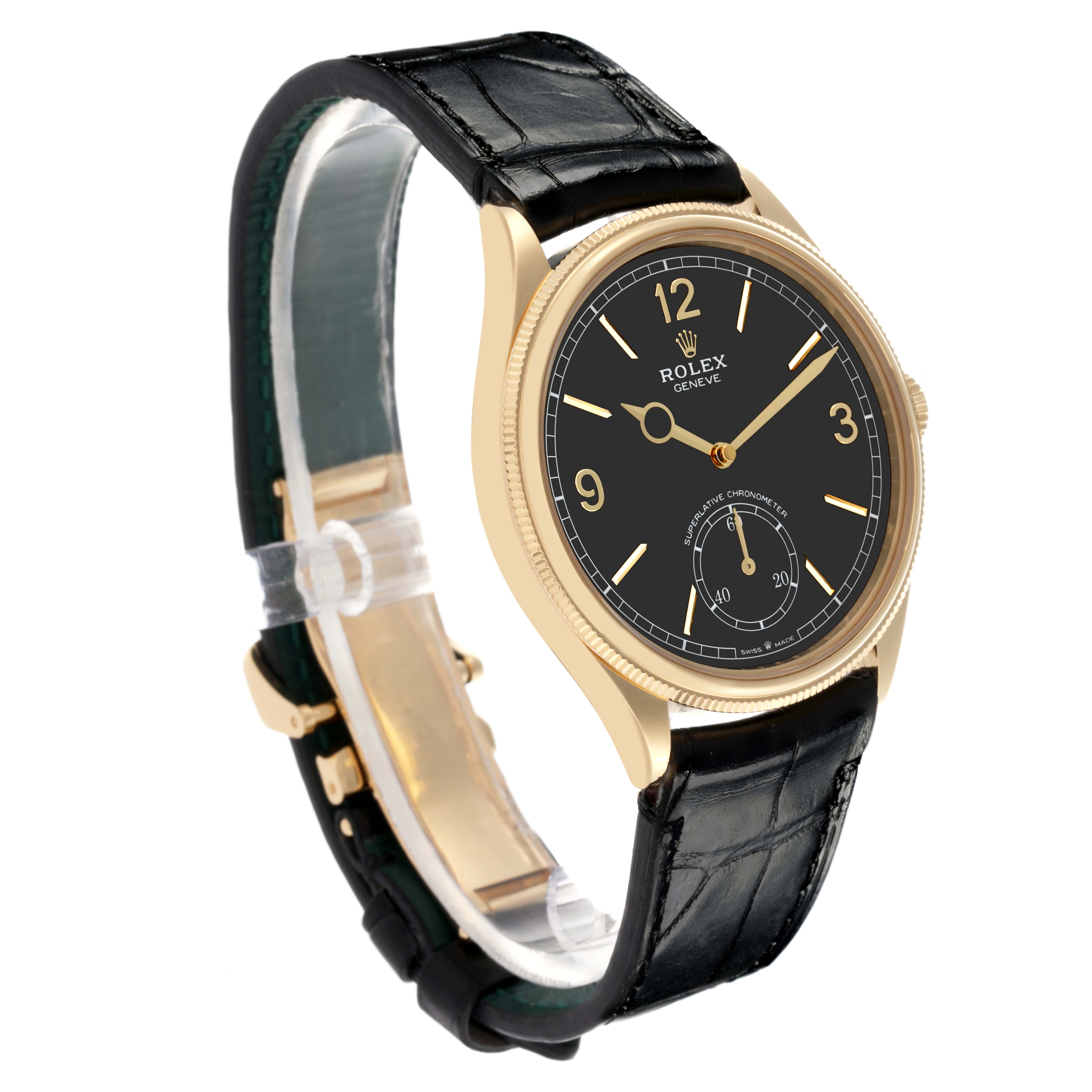 The Rolex 1908 52508-0002 Men's Yellow Gold Black Dial 52508-0002 Men's Yellow Gold Black Dial watch is shown at a three-quarter angle, highlighting its gold case, black face, and leather strap.