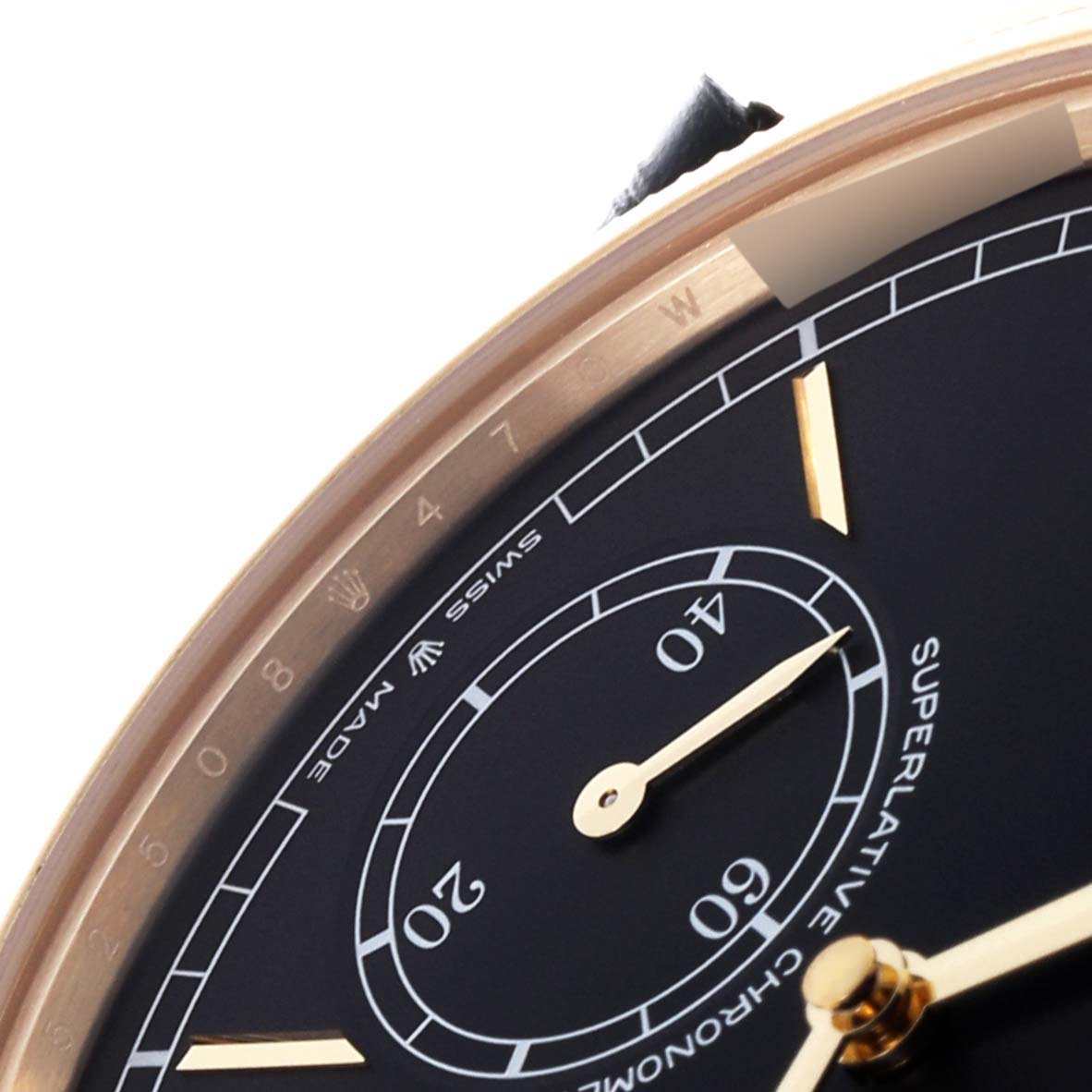 The image shows a close-up of the Rolex 1908 52508-0002 Men's Yellow Gold Black Dial 52508-0002 Men's Yellow Gold Black Dial model, highlighting the dial and part of the bezel from an oblique angle.