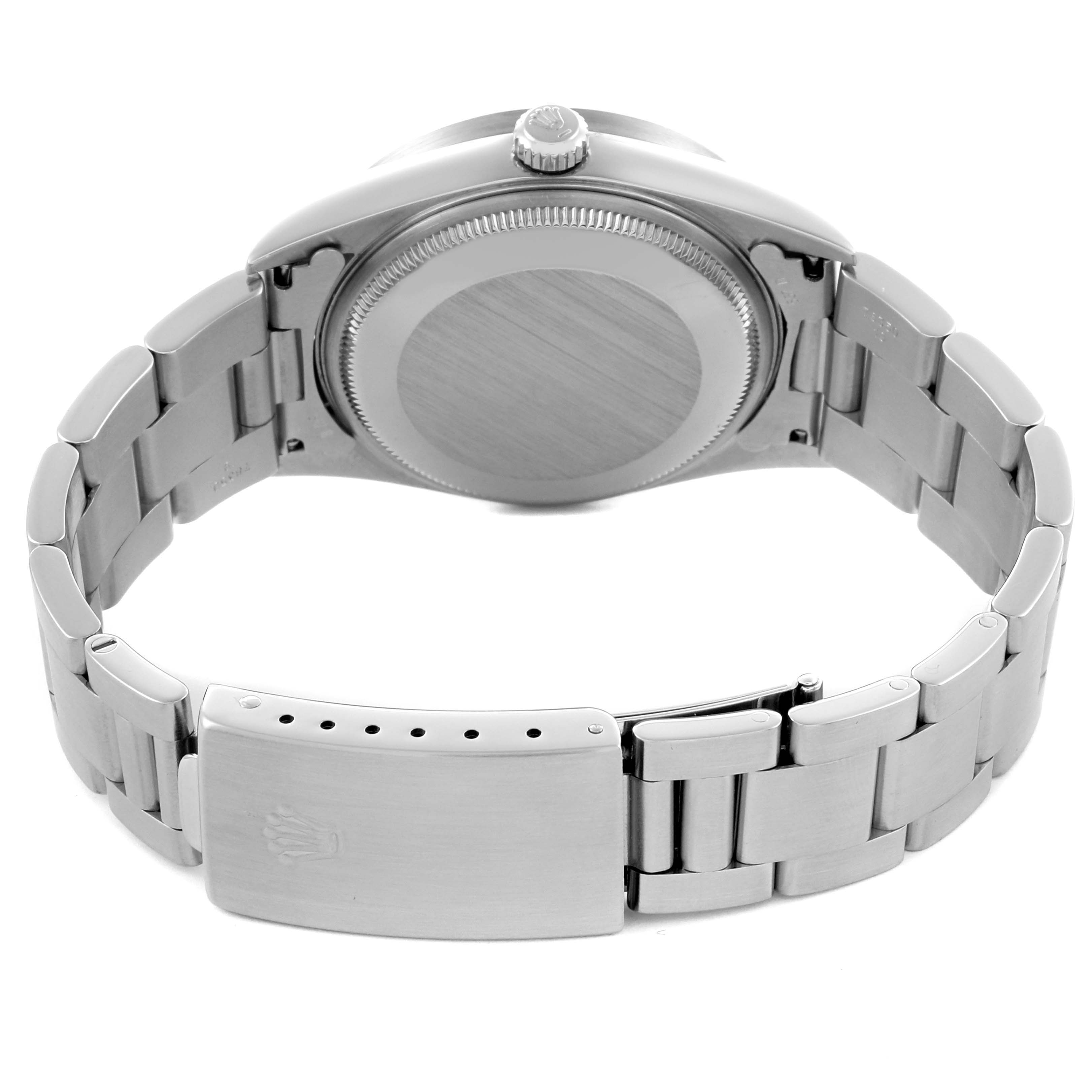 The image shows the back of a Rolex Air-King 14010 Men's Stainless Steel White Dial 14010 Men's Stainless Steel White Dial watch, highlighting the case back and bracelet clasp.