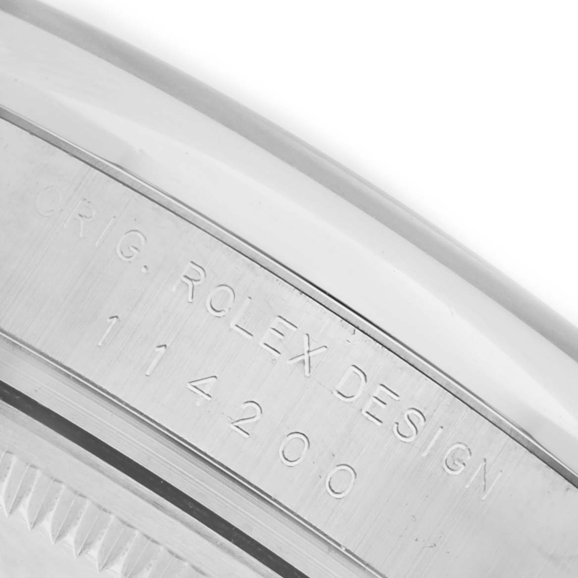 The image shows the engraved side of the Rolex Air-King 114200 Men's Stainless Steel Blue Dial 114200 Men's Stainless Steel Blue Dial watch case, highlighting the model number "114200."