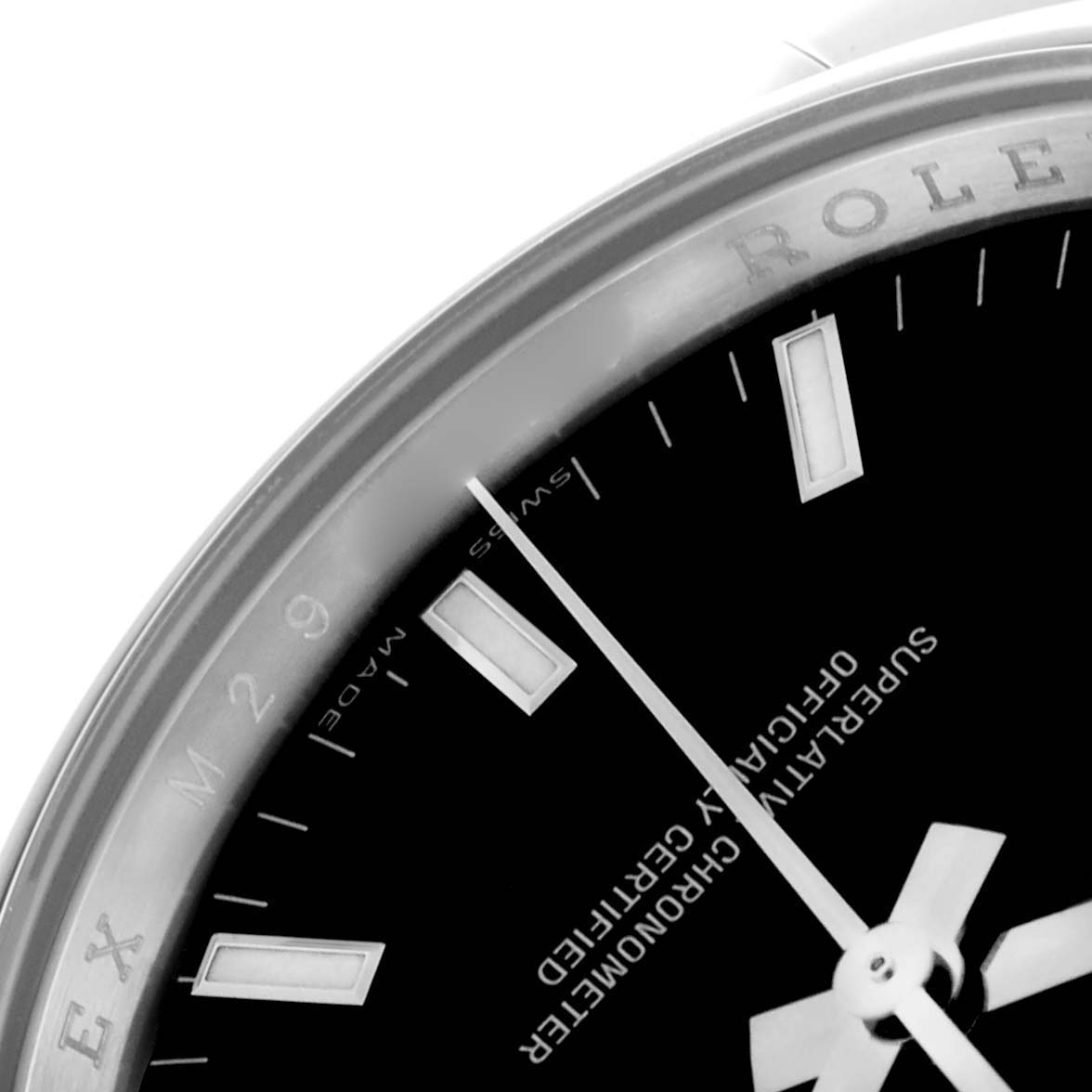 The image shows a close-up of the dial and bezel of a Rolex Date 115200 Men
s Stainless Steel Black Dial 115200 Men
s Stainless Steel Black Dial model, highlighting the hour markers and branding.