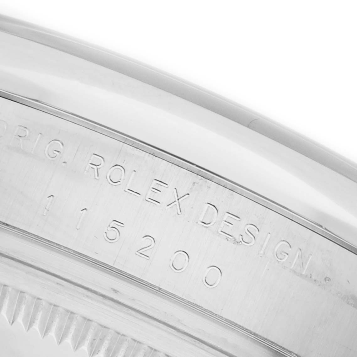 The image shows a close-up of the inner bezel with engravings on a Rolex Date 115200 Men
s Stainless Steel Black Dial 115200 Men
s Stainless Steel Black Dial model watch.