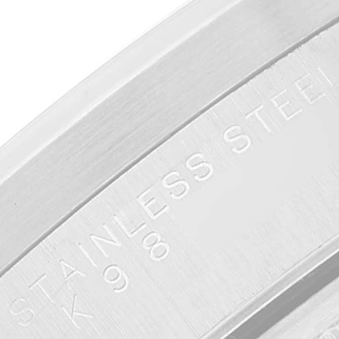 The image shows a close-up of the stainless steel case back of a Rolex Date 15210 Men
s Stainless Steel Blue Dial 15210 Men
s Stainless Steel Blue Dial model watch.