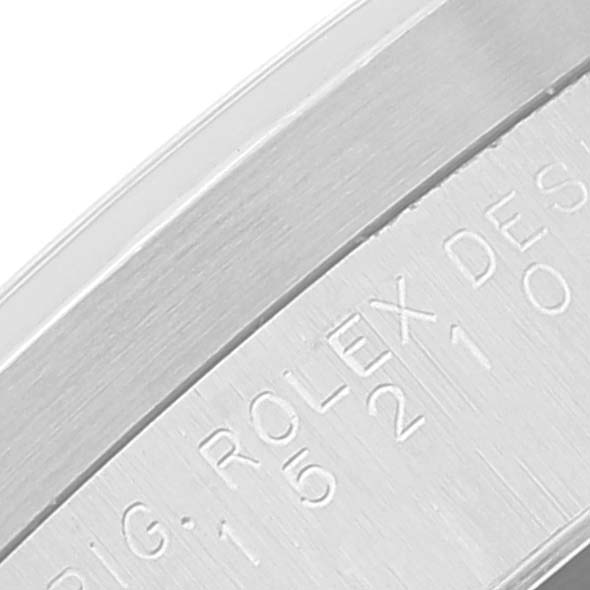 The image shows a close-up of the engraved bezel of a Rolex Date 15210 Men
s Stainless Steel Blue Dial 15210 Men
s Stainless Steel Blue Dial model watch.