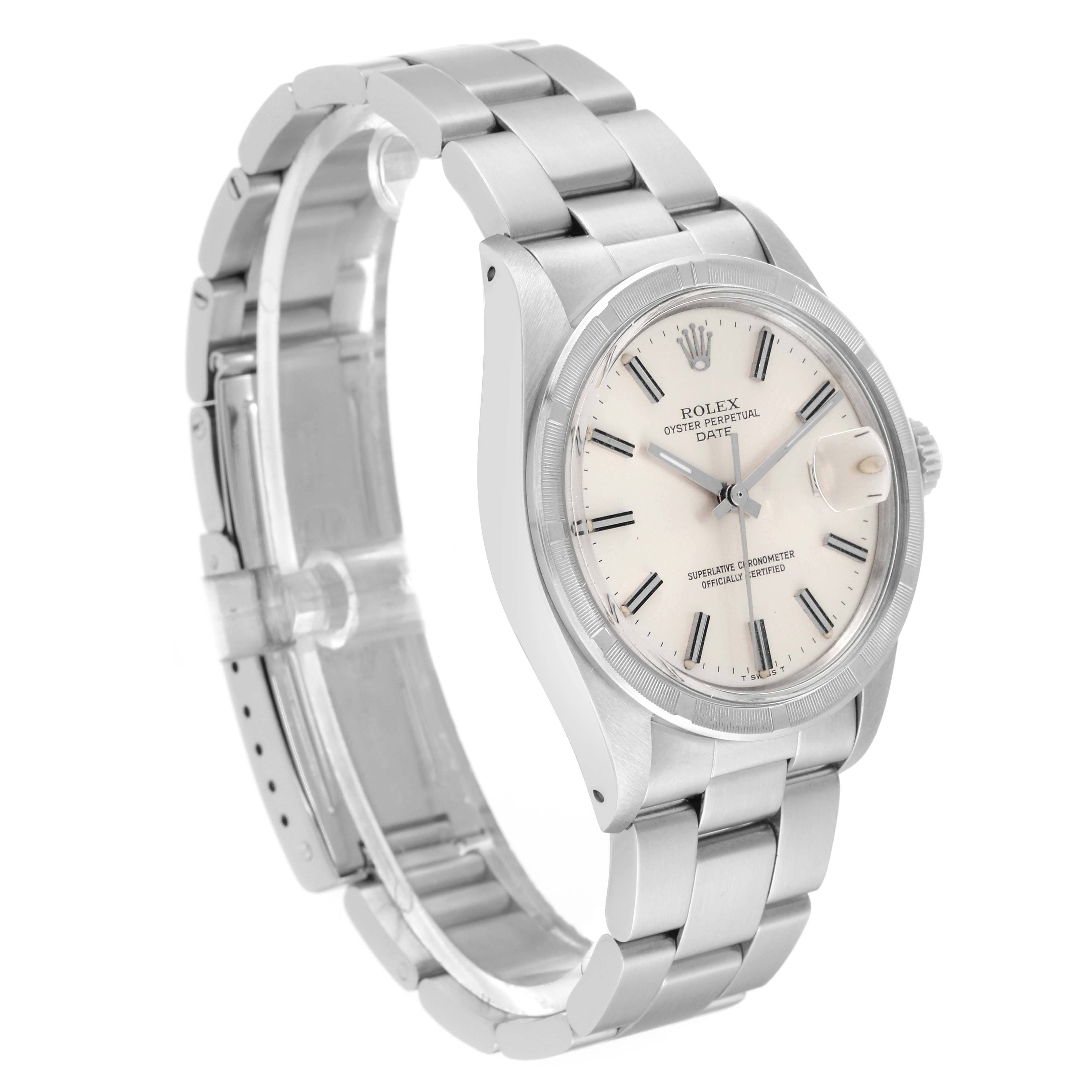 The Vintage Collection Rolex watch is shown at an oblique angle, displaying its face, bezel, and bracelet.