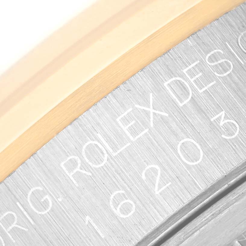 The image shows a close-up view of the case side of a Rolex Datejust 16203 Men's Stainless Steel Champagne Dial 16203 Men's Stainless Steel Champagne Dial, displaying the model number and engraving.