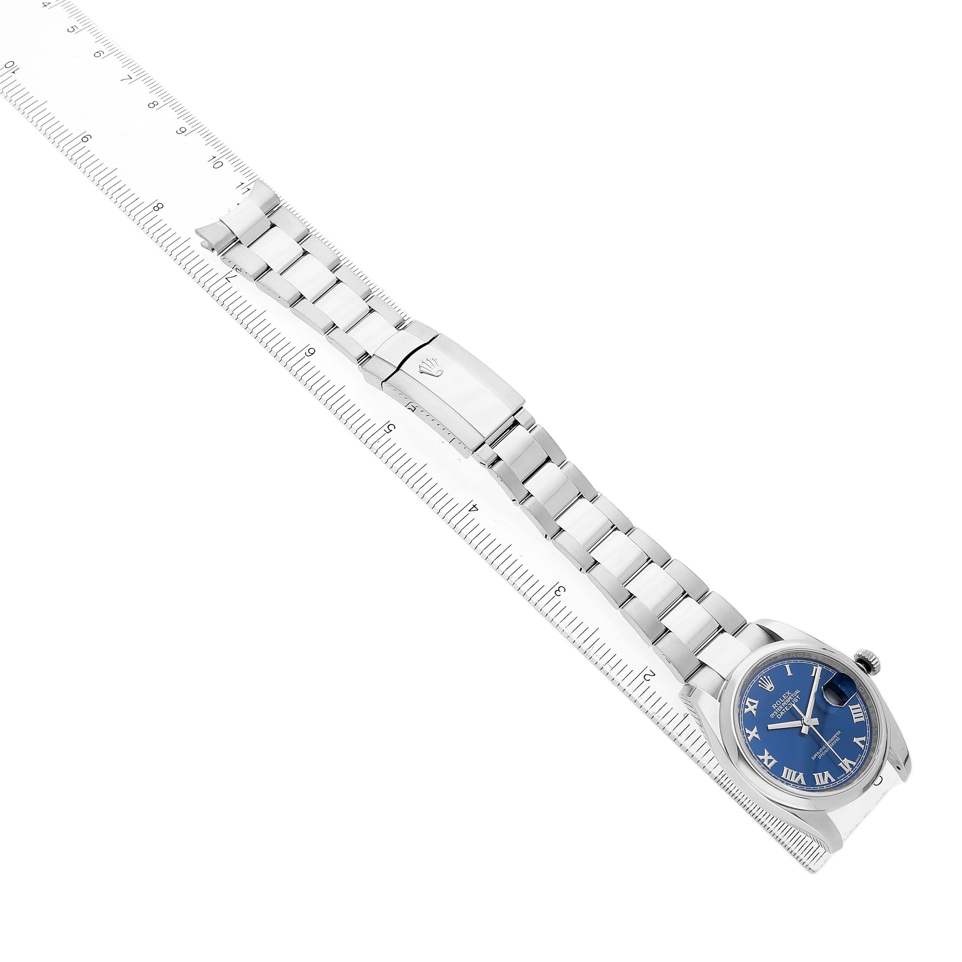 The Rolex Datejust 116200 Men's Stainless Steel Blue Dial watch is displayed diagonally with a side view, showing the bracelet, clasp, and blue dial.