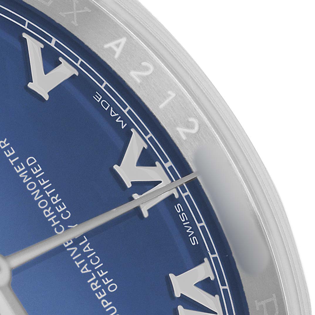 The image shows a close-up of the Rolex Datejust 116200 Men's Stainless Steel Blue Dial watch face, focusing on Roman numerals and partial bezel.