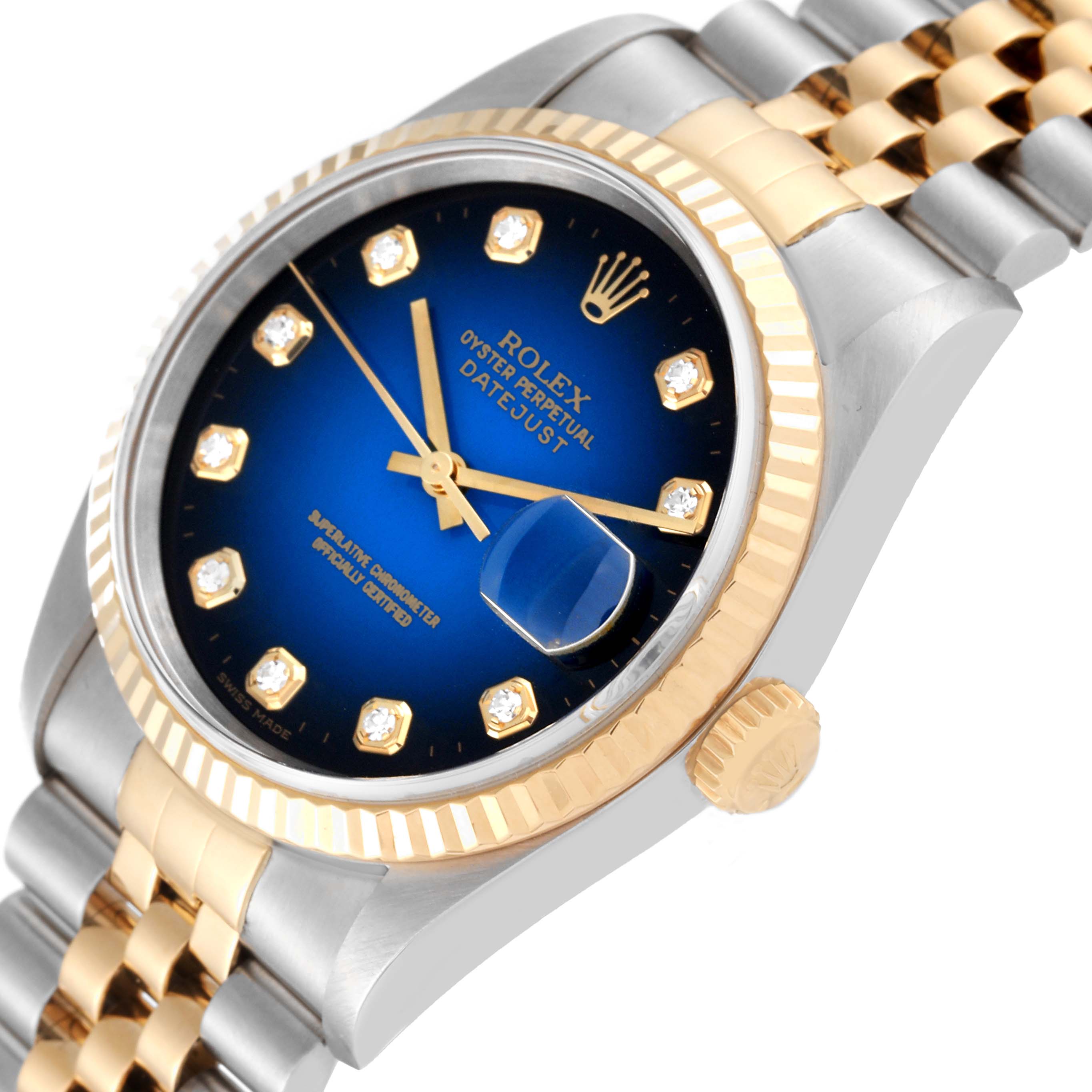 This image shows the face, crown, and part of the bracelet of a Rolex Datejust 16233 Men's Steel and Gold (two tone) Blue Dial 16233 Men's Steel and Gold (two tone) Blue Dial watch at an angled close-up.