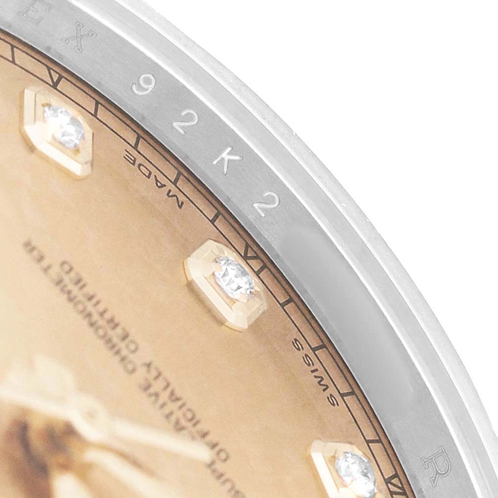 The image shows a close-up of the Rolex Datejust 41 116333 Men's Steel and Gold (two tone) Champagne Dial's dial edge and bezel, highlighting diamond hour markers.