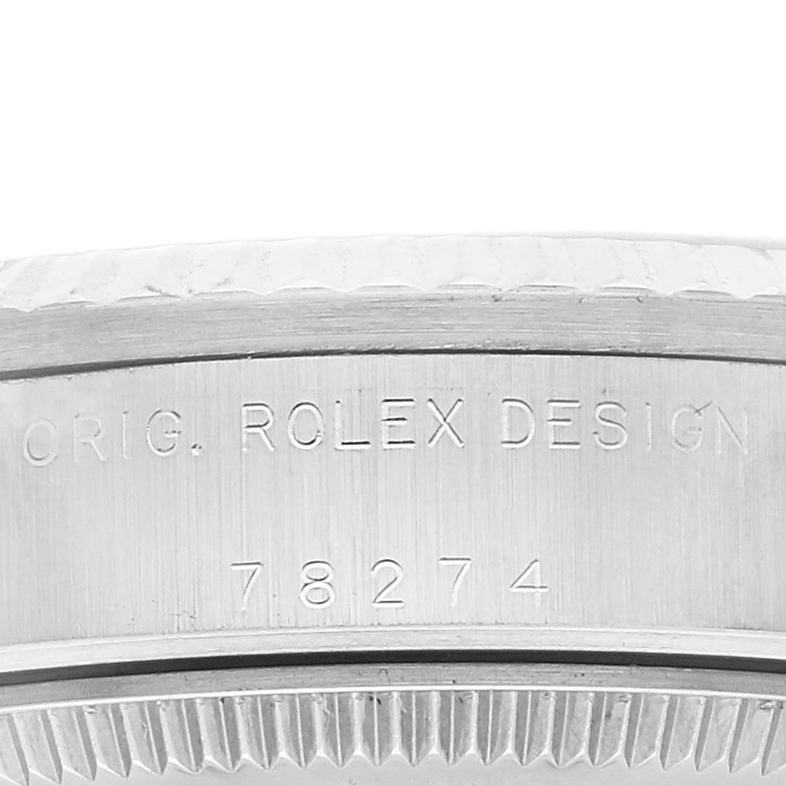 The image shows a close-up of the side of a Rolex Mid-Size 78274 Women
s Stainless Steel White Dial 78274 Women
s Stainless Steel White Dial model watch, displaying the serial number and "Orig. Rolex Design" engraving.