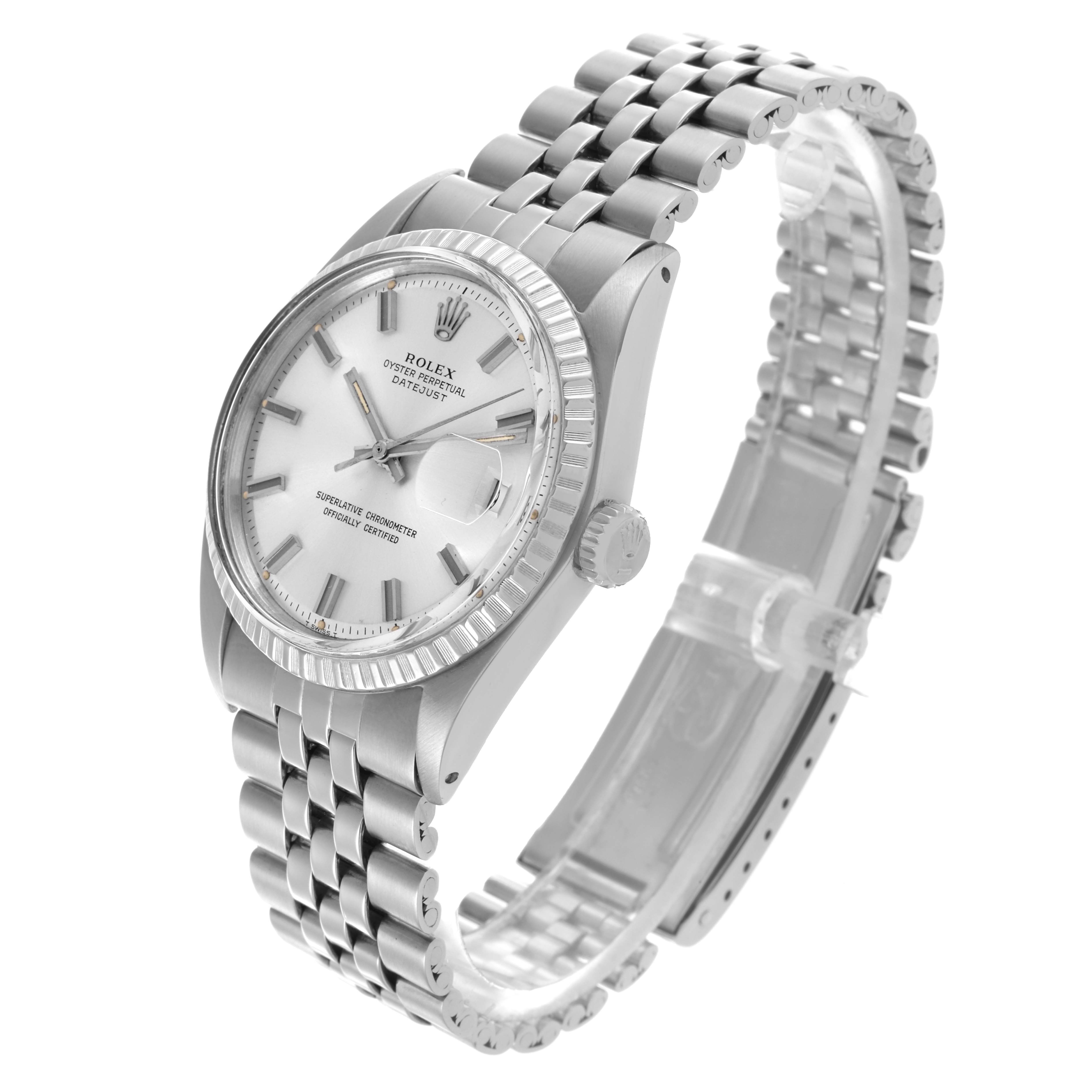 The Rolex Datejust 1603 Men
s Stainless Steel Silver Dial 1603 Men
s Stainless Steel Silver Dial watch is shown from a front-side angle, highlighting its face, bezel, crown, and bracelet.