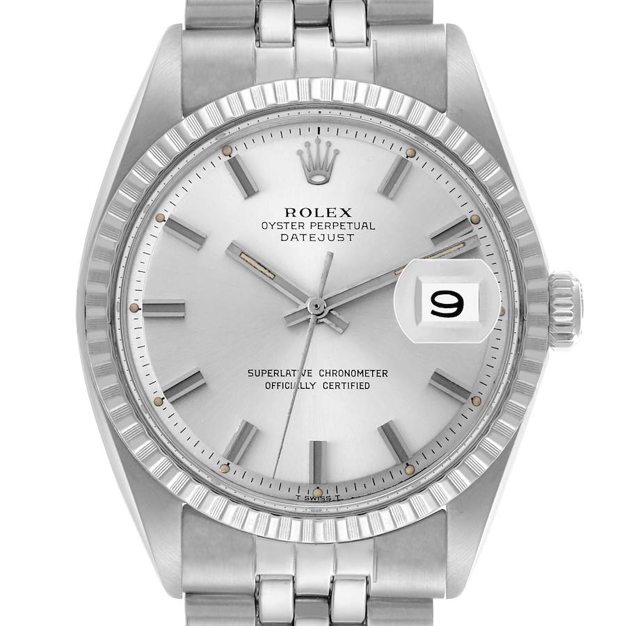 The Rolex Datejust watch is shown from a front angle, highlighting the dial, date window, bezel, and a portion of the bracelet.