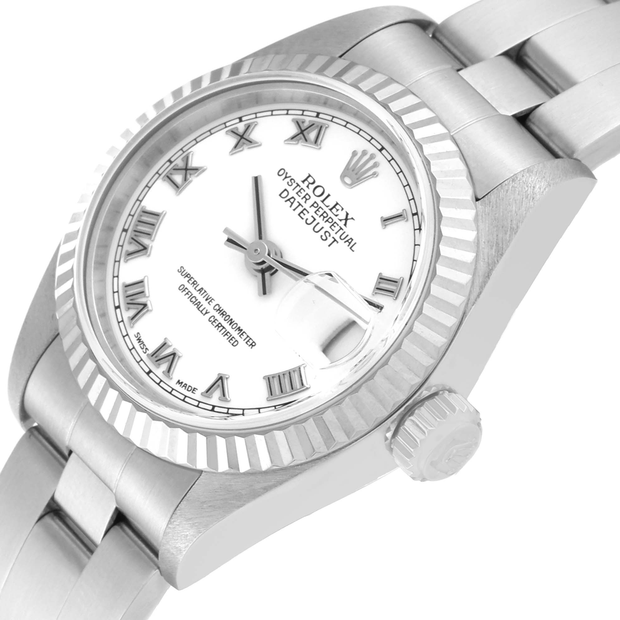 The image shows the Rolex Datejust 79174 Women's Stainless Steel White Dial 79174 Women's Stainless Steel White Dial watch at an angle displaying its face, bezel, crown, and part of the bracelet.