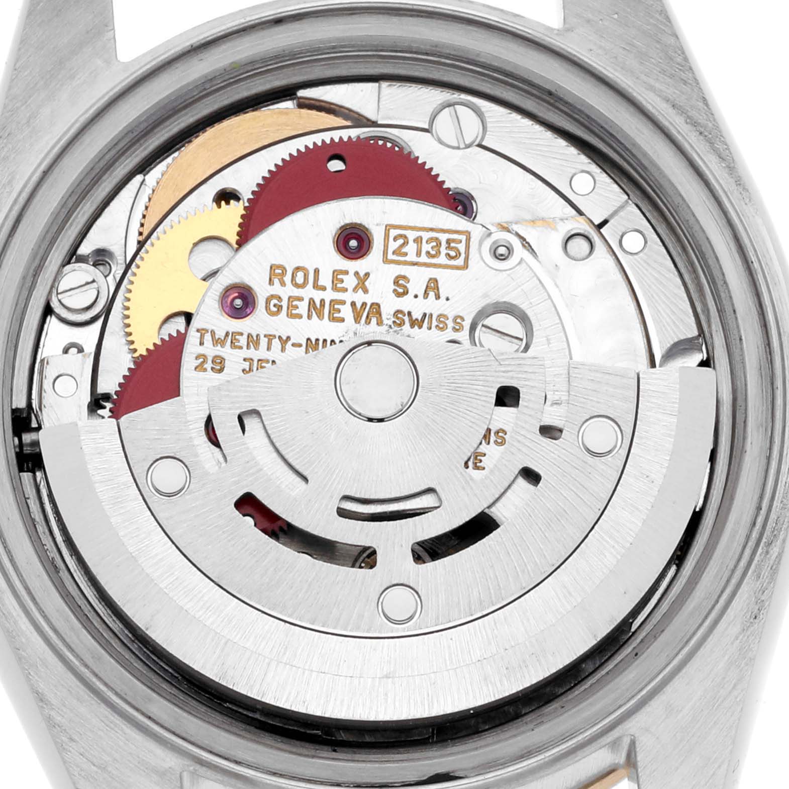 The image shows the interior movement of a Rolex Datejust 69173 Women's Steel and Gold (two tone) Black Dial 69173 Women's Steel and Gold (two tone) Black Dial watch, highlighting gears and the rotor.