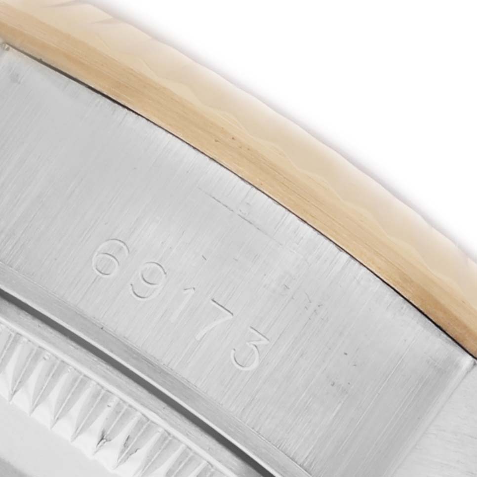 The image shows a close-up of the case side and edge of the bezel for a Rolex Datejust 69173 Women's Steel and Gold (two tone) Black Dial 69173 Women's Steel and Gold (two tone) Black Dial watch, highlighting the model number.