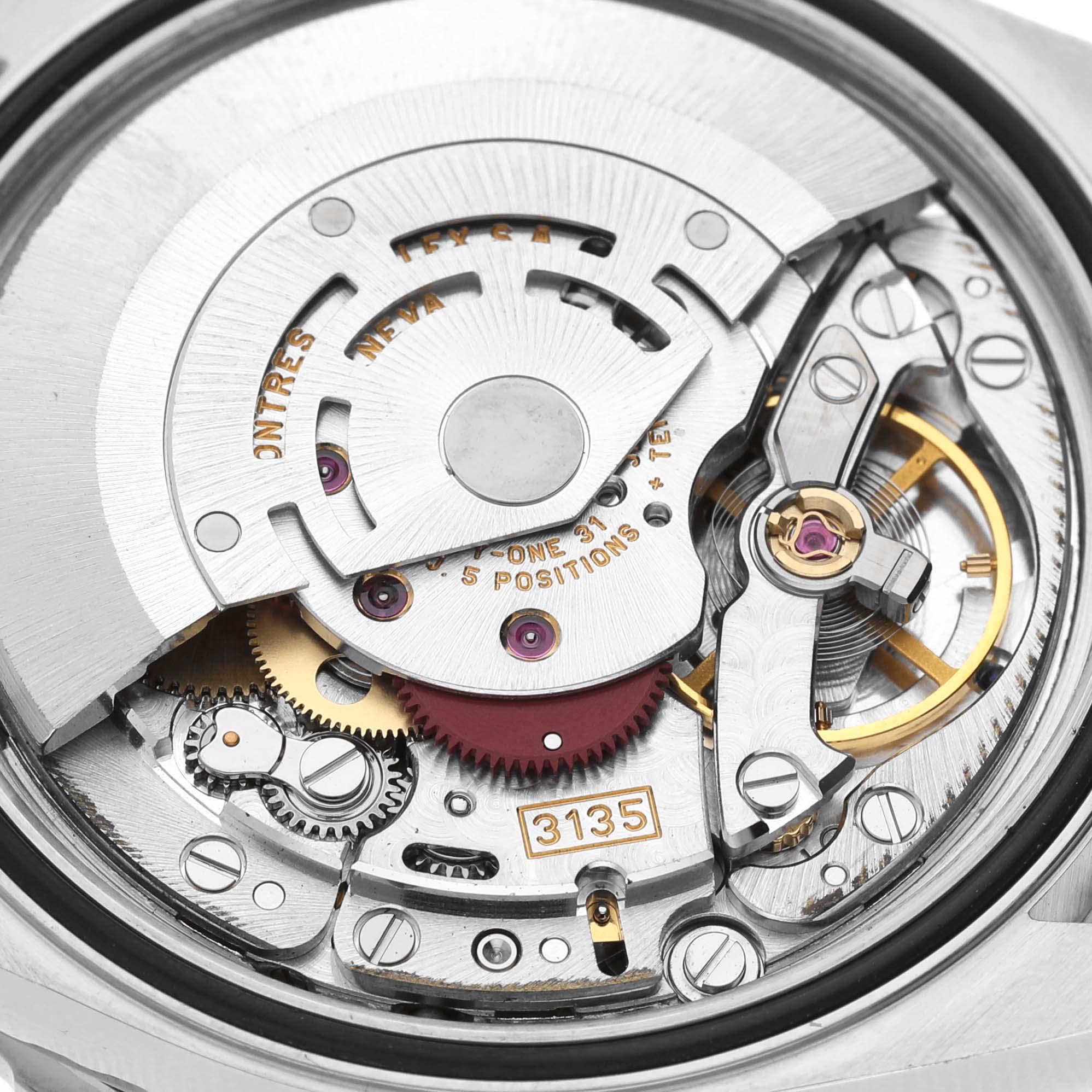 This image shows a close-up view of the movement mechanism inside a Rolex Turn-o-Graph 16264 Men
s Stainless Steel Blue Dial 16264 Men
s Stainless Steel Blue Dial watch.