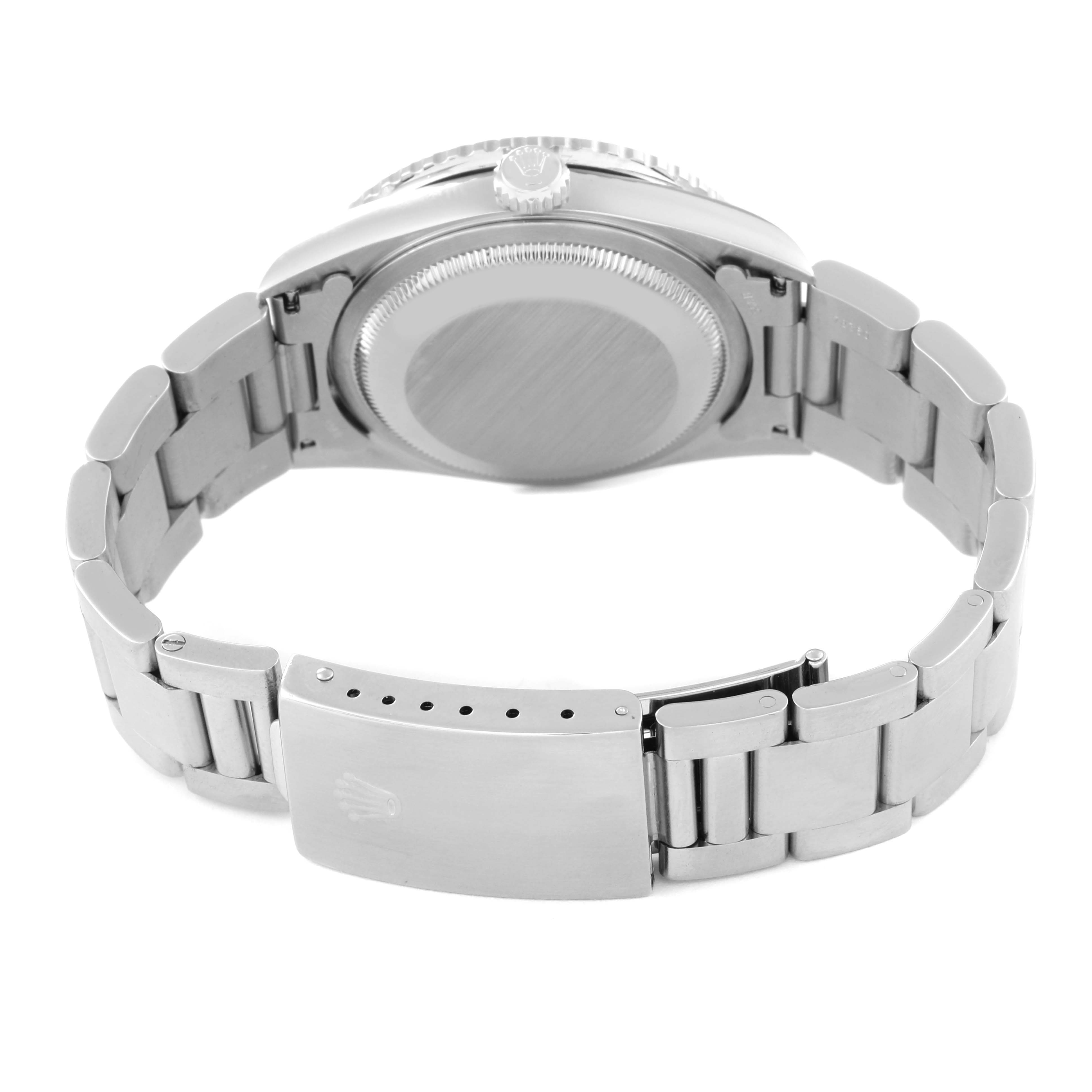 The image shows the back view of a Rolex Turn-o-Graph 16264 Men
s Stainless Steel Blue Dial 16264 Men
s Stainless Steel Blue Dial watch, including the case back, crown, and stainless steel bracelet with the clasp.