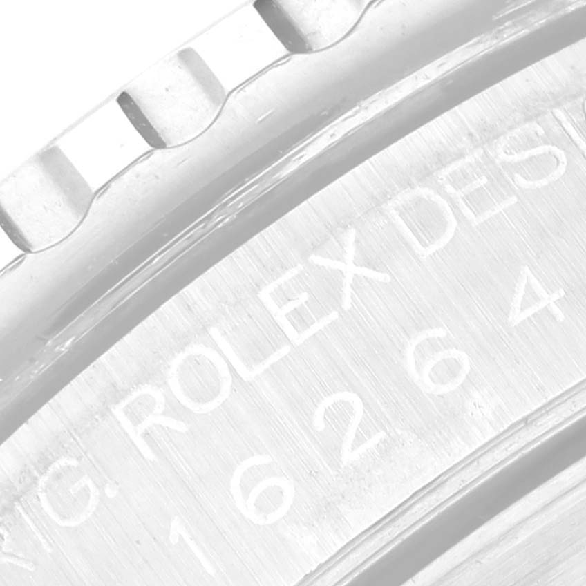 The image shows a close-up of the bezel and engraved text on the edge of a Rolex Turn-o-Graph 16264 Men
s Stainless Steel Blue Dial 16264 Men
s Stainless Steel Blue Dial model.