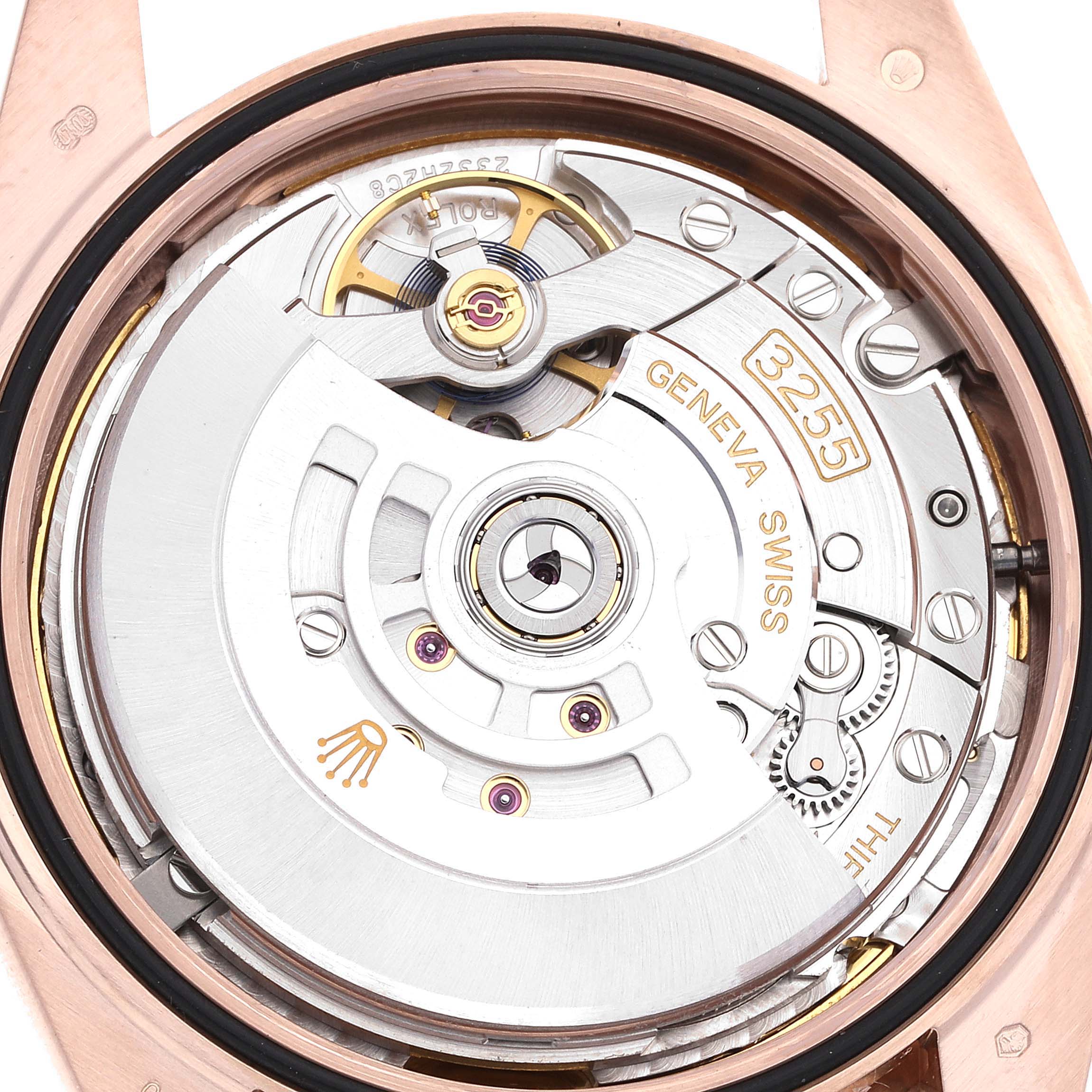 This close-up image shows the intricate movement mechanism of the Rolex President 228235 Men's Rose Gold Brown Dial 228235 Men's Rose Gold Brown Dial model watch.