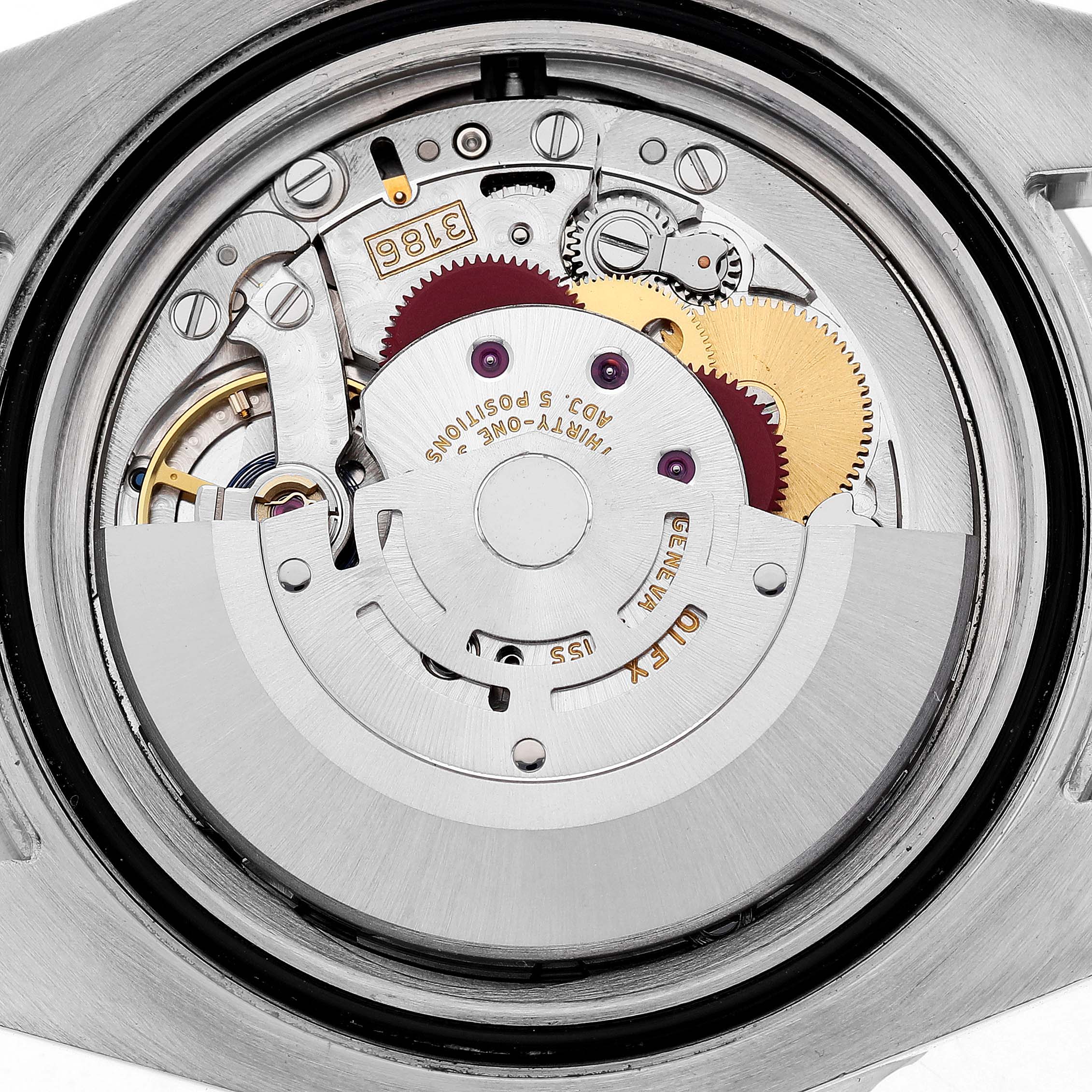 The image shows the inner movement of the Rolex GMT-Master 116710LN Men's Stainless Steel Black Dial watch, focusing on its intricate mechanical components.