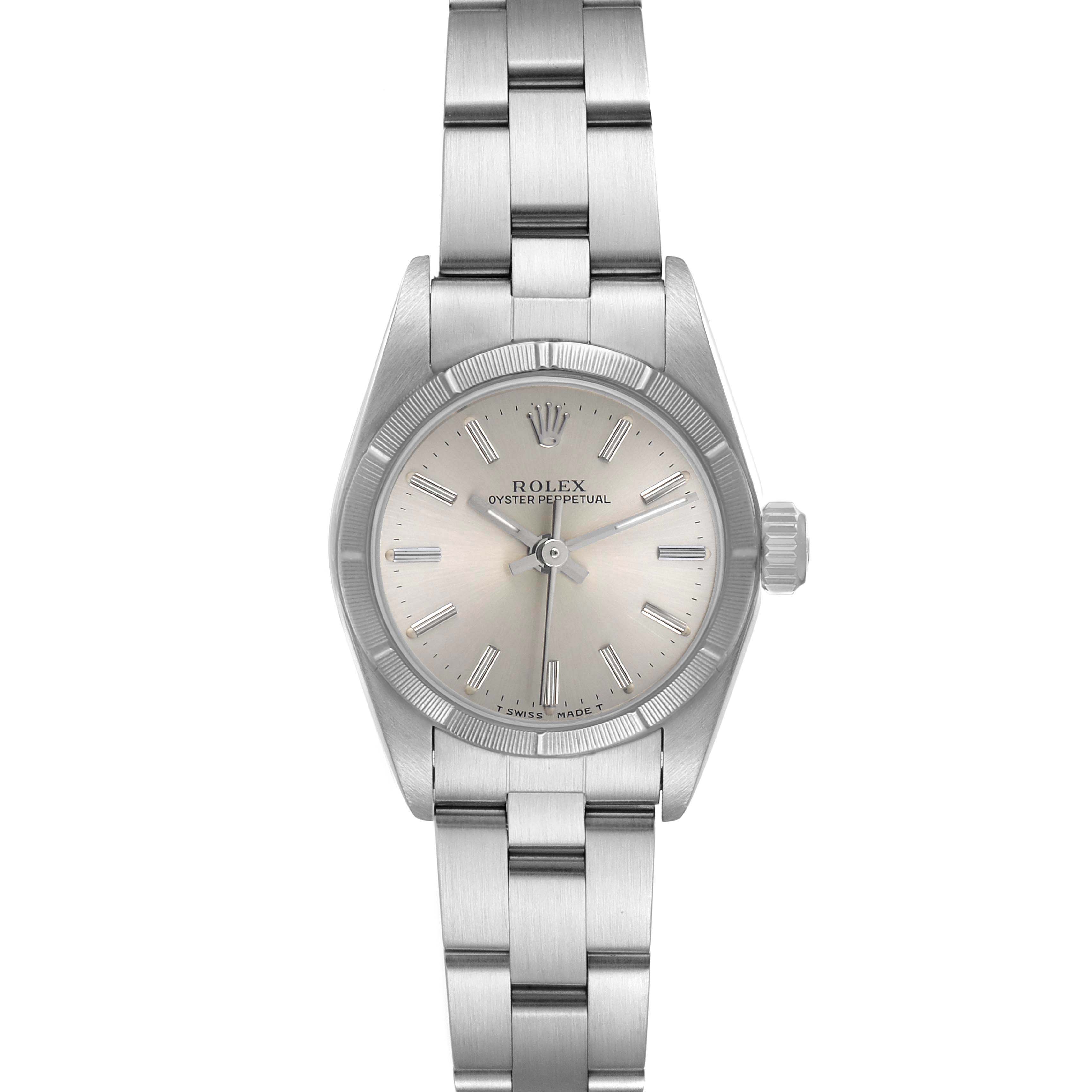 The Rolex Oyster Perpetual 67230 Women's Stainless Steel Silver Dial watch is shown from a top-down angle, displaying the full face, bracelet, and clasp.