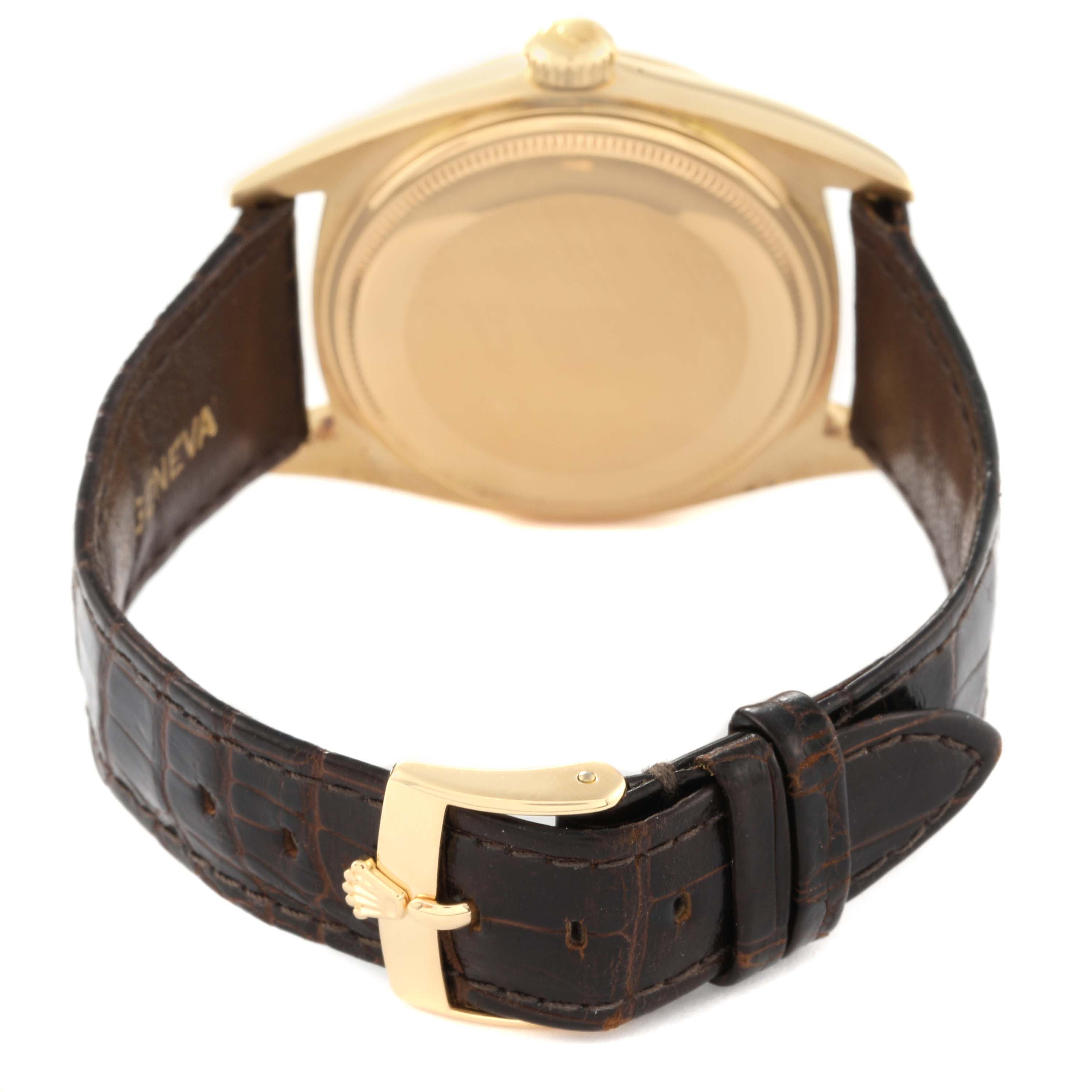 The image shows the back case and strap of a Rolex Vintage Collection 1803 Men's Yellow Gold Champagne Dial 1803 Men's Yellow Gold Champagne Dial watch.