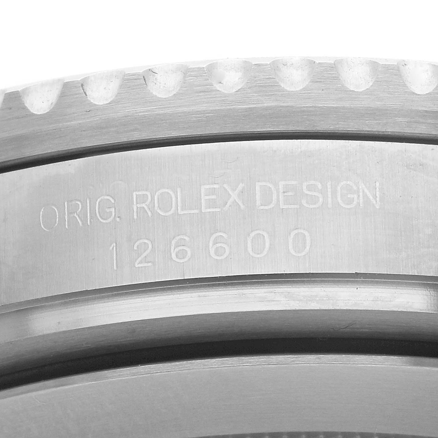 The image shows a close-up of the side of a Rolex Sea-Dweller 126600 Men's Stainless Steel Black Dial, focusing on the engraved model number "126600."