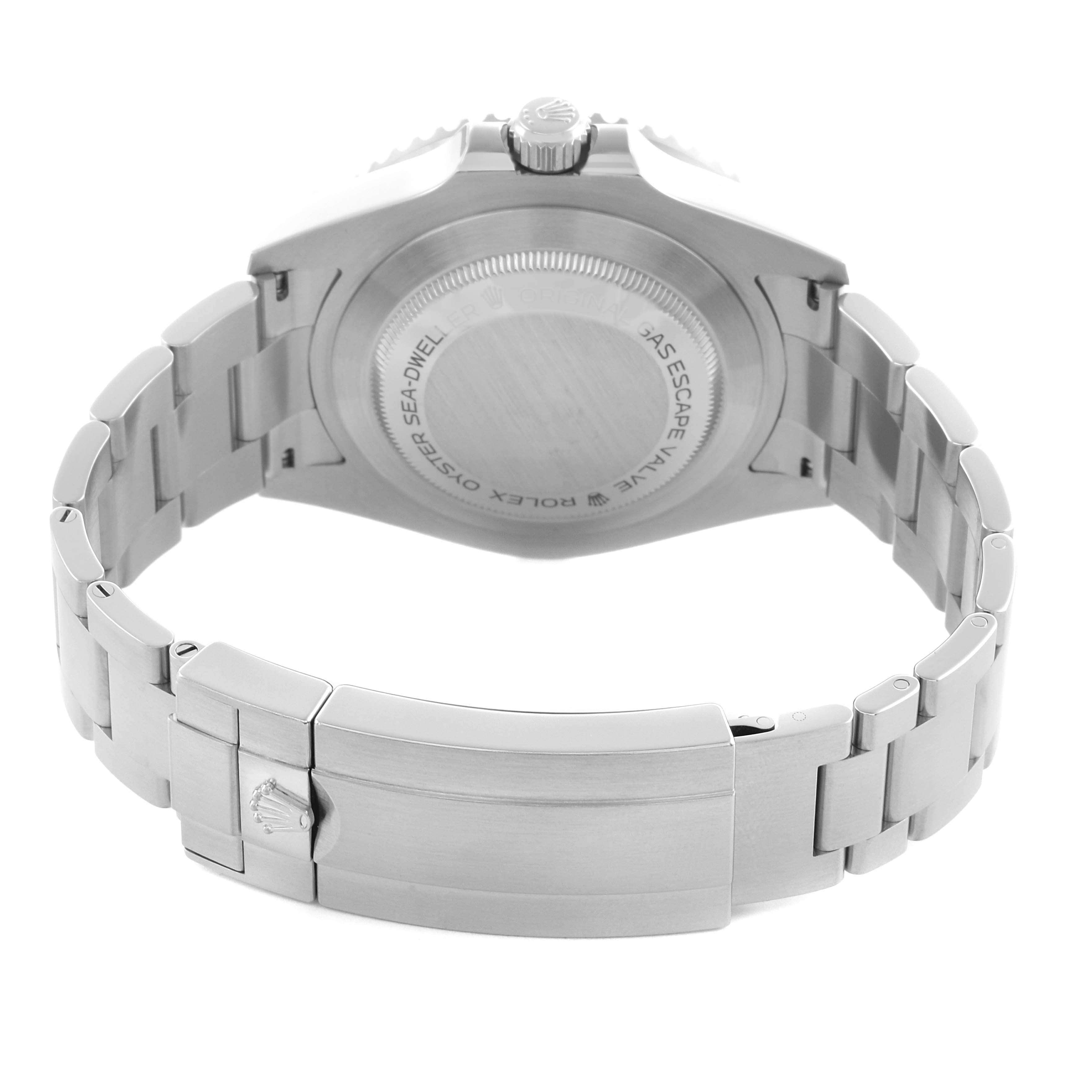 The image shows the back and clasp of a Rolex Sea-Dweller 126600 Men's Stainless Steel Black Dial, featuring the closed bracelet and case back engravings.