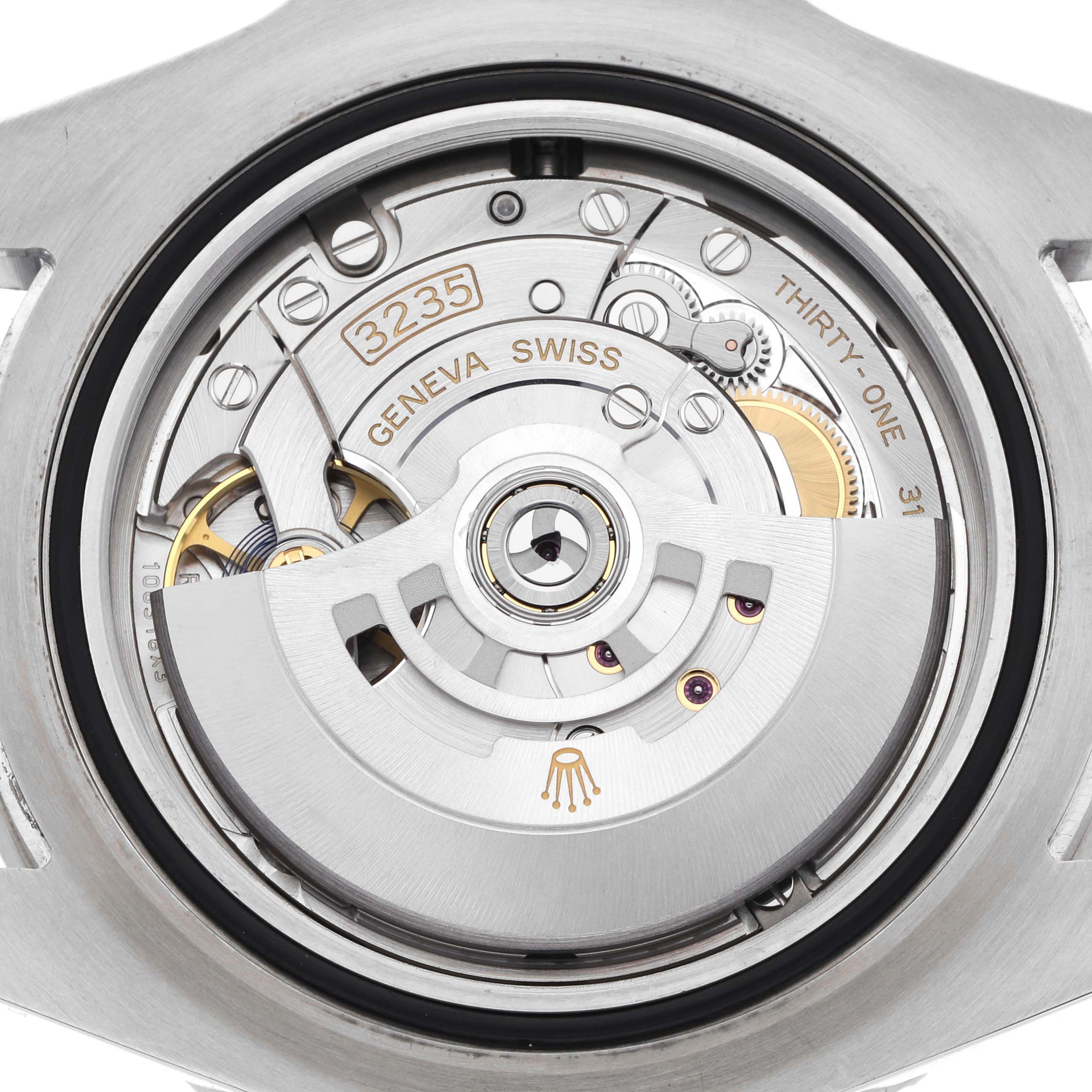 The image shows the open case back of a Rolex Sea-Dweller 126600 Men's Stainless Steel Black Dial, revealing the intricate movement and rotor of the watch.