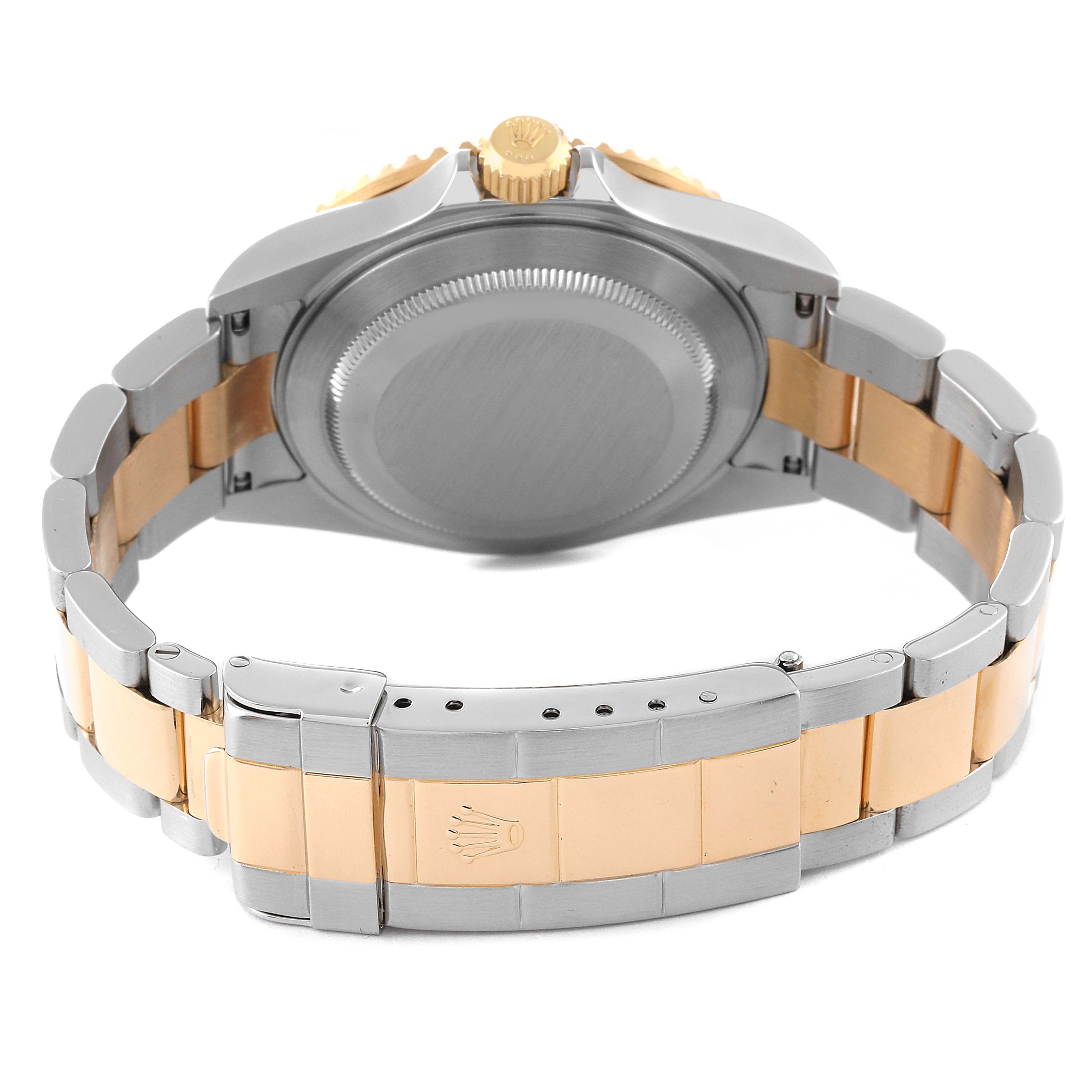 The image shows the back case and bracelet of a Rolex Submariner 16613 Men's Steel and Gold (two tone) Blue Dial 16613 Men's Steel and Gold (two tone) Blue Dial, highlighting the two-tone metal design and clasp.