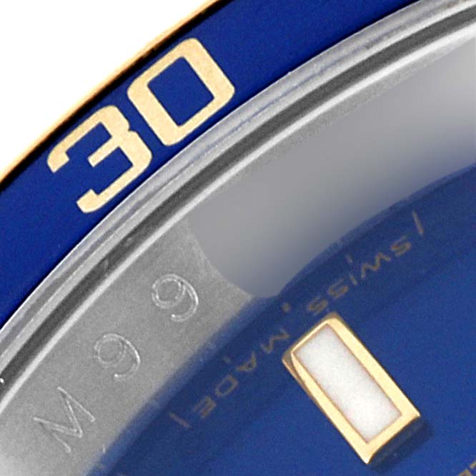 The image shows a close-up of the blue bezel and part of the dial of a Rolex Submariner 16613 Men's Steel and Gold (two tone) Blue Dial 16613 Men's Steel and Gold (two tone) Blue Dial watch, highlighting the number "30".