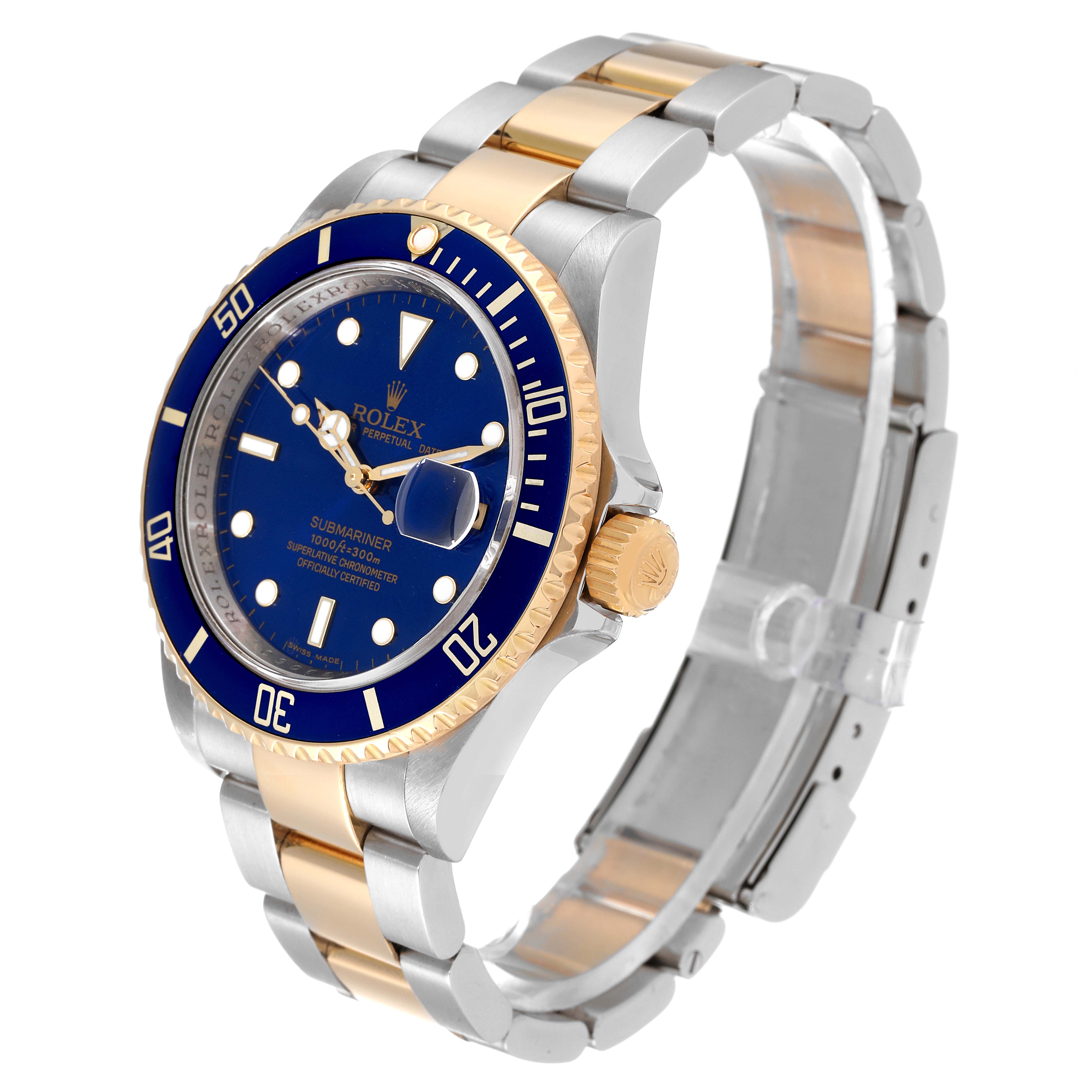 The image shows a Rolex Submariner 16613 Men's Steel and Gold (two tone) Blue Dial 16613 Men's Steel and Gold (two tone) Blue Dial watch from a front-left angle, highlighting its bezel, dial, crown, and two-tone bracelet.
