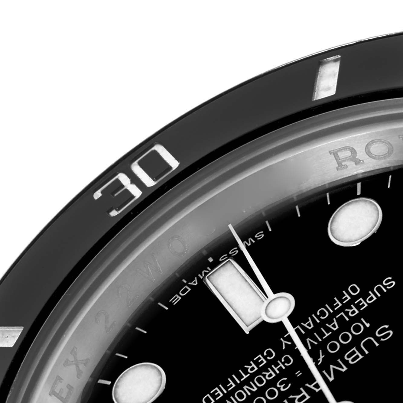 The image shows a close-up of the bezel and part of the dial on a Rolex Submariner 116610LN Men's Stainless Steel Black Dial 116610LN Men's Stainless Steel Black Dial watch, focusing on the "30" mark.