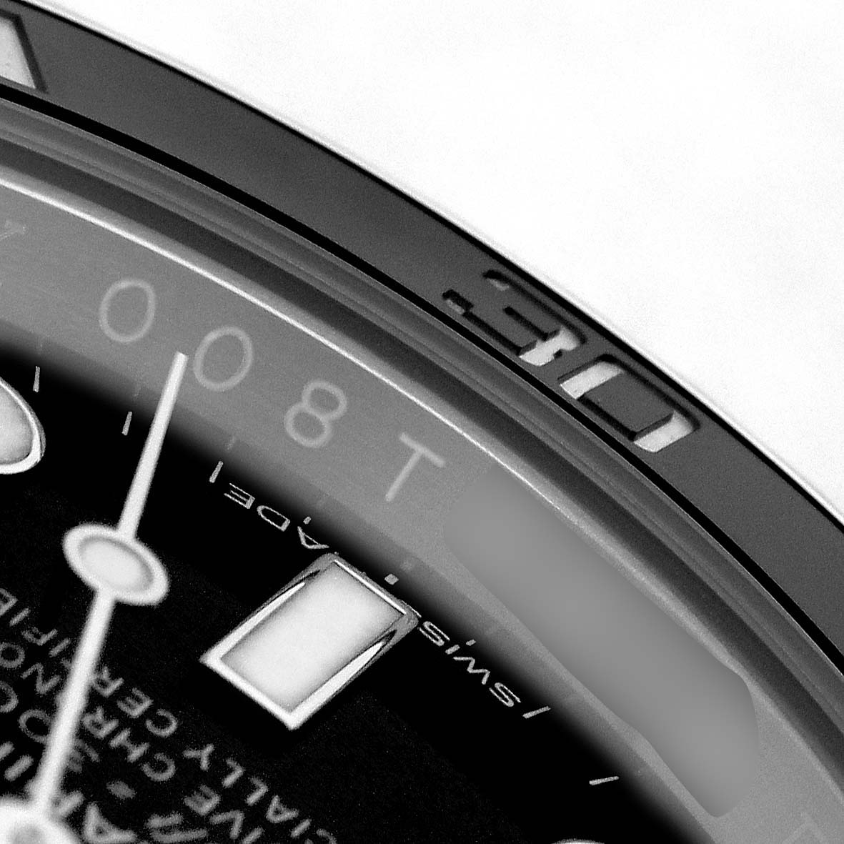 The image shows a close-up of the bezel and dial edge of a Rolex Submariner 116610 Men's Stainless Steel Black Dial, highlighting the "30" marker and part of the hour markers.