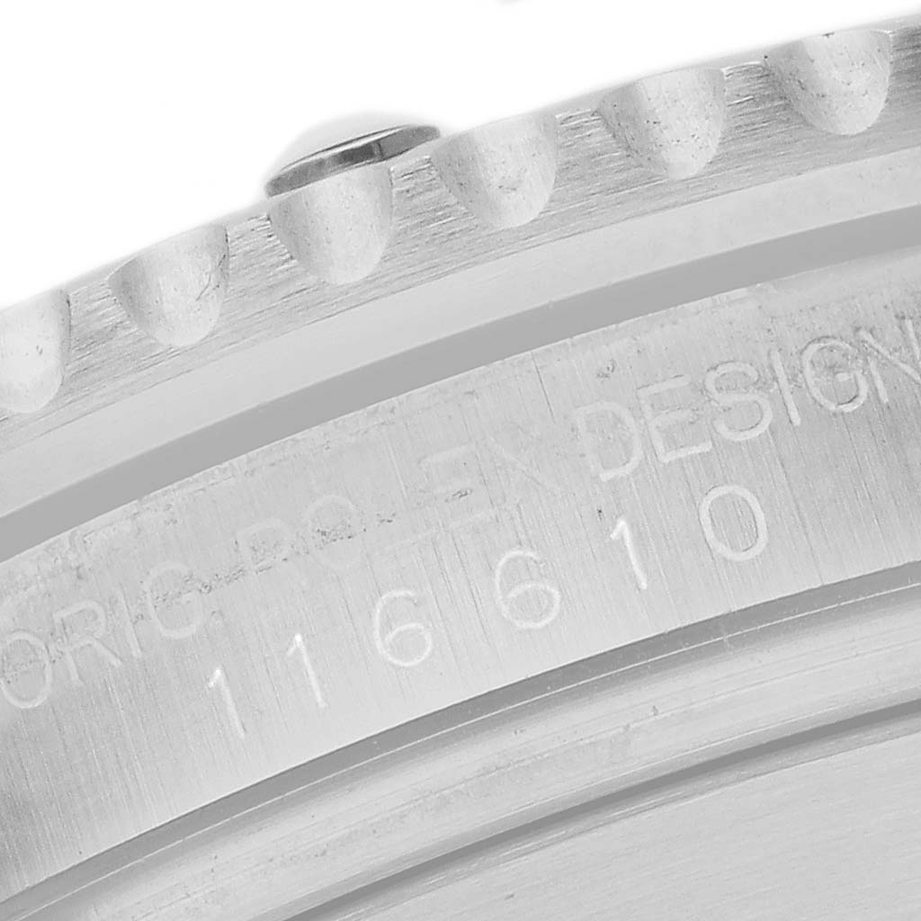 The image shows a close-up of the case side and engraved model number on a Rolex Submariner 116610 Men's Stainless Steel Black Dial bezel from a side angle.