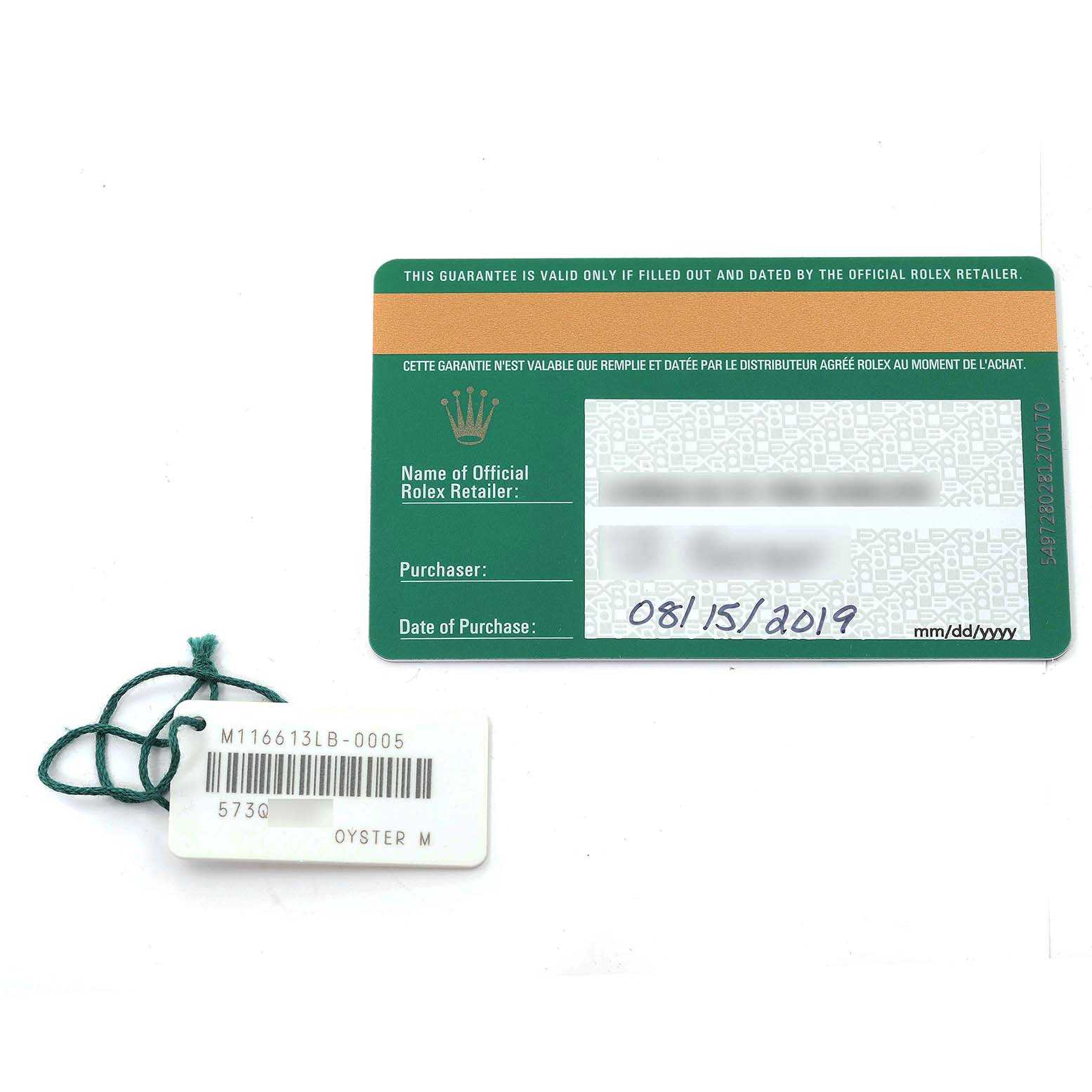 The image shows a Rolex Submariner 116613 Men's Steel and Gold (two tone) Blue Dial 116613 Men's Steel and Gold (two tone) Blue Dial guarantee card and a tag with the model number and accessory details, viewed from the top.