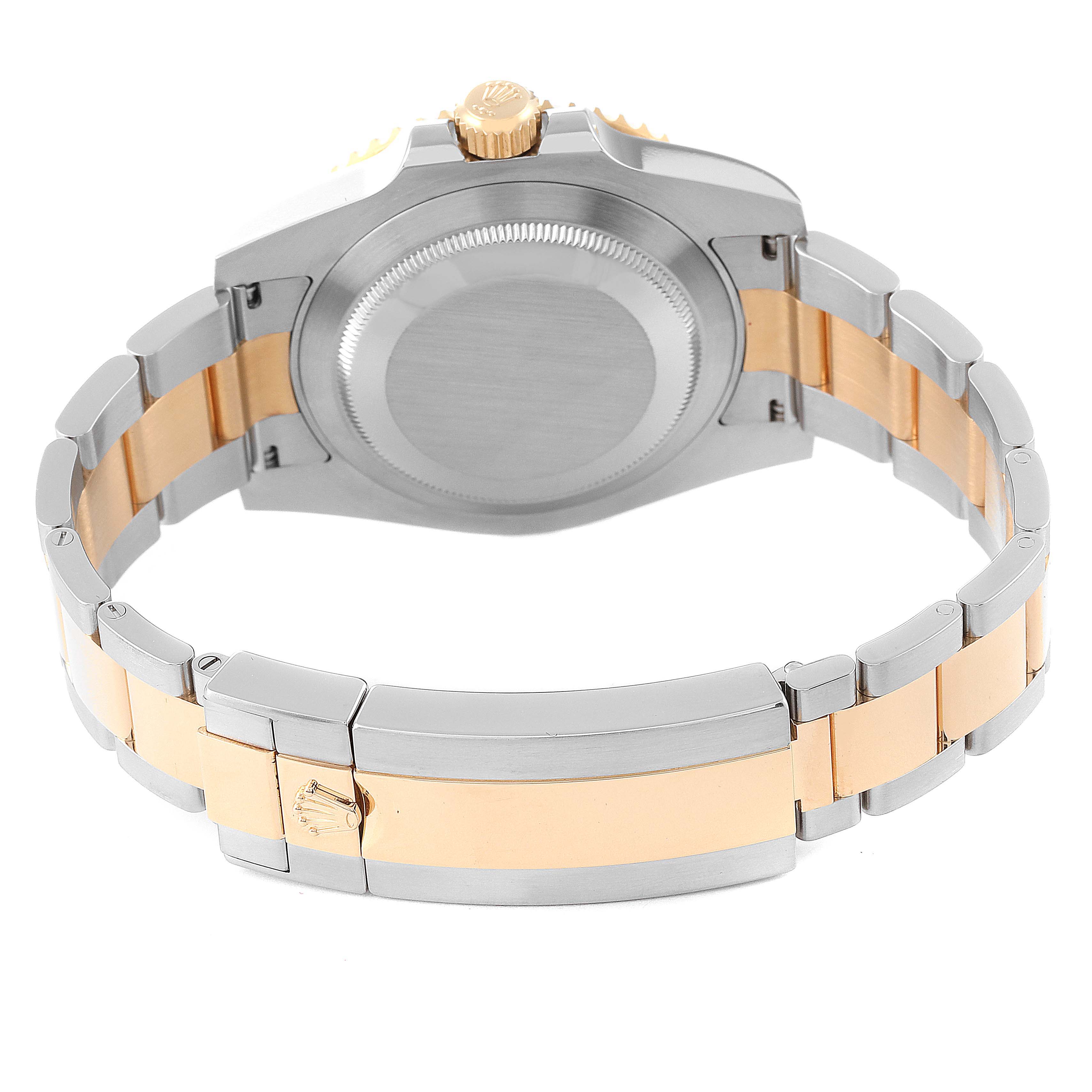 The image shows the back case and the bracelet of a Rolex Submariner 116613 Men's Steel and Gold (two tone) Blue Dial 116613 Men's Steel and Gold (two tone) Blue Dial watch, highlighting the clasp and crown.