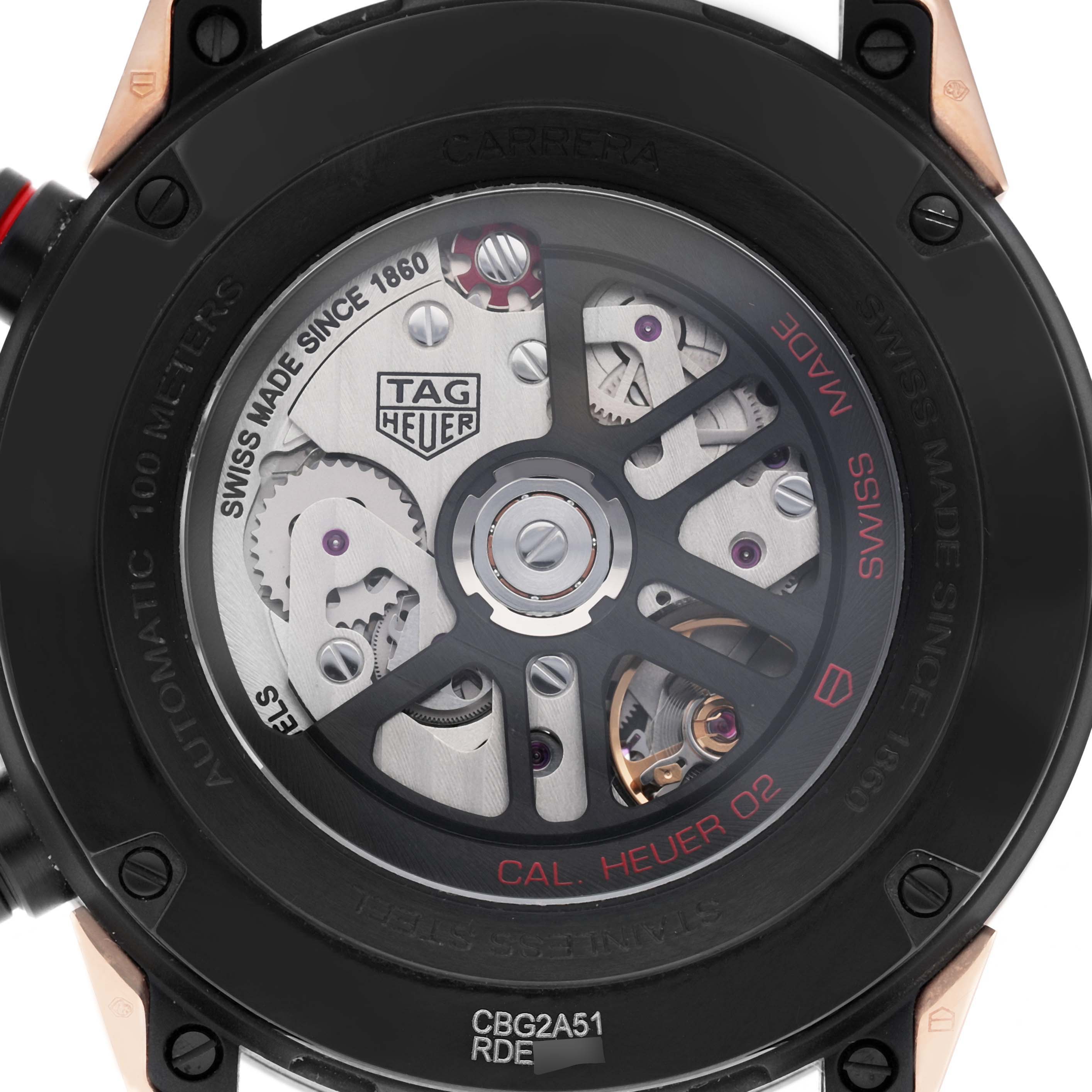 The image shows the back view of a Tag Heuer Carrera CBG2A51.FC6450 Men's Steel and Gold (two tone) Black Dial watch, highlighting its automatic movement and intricate mechanics.