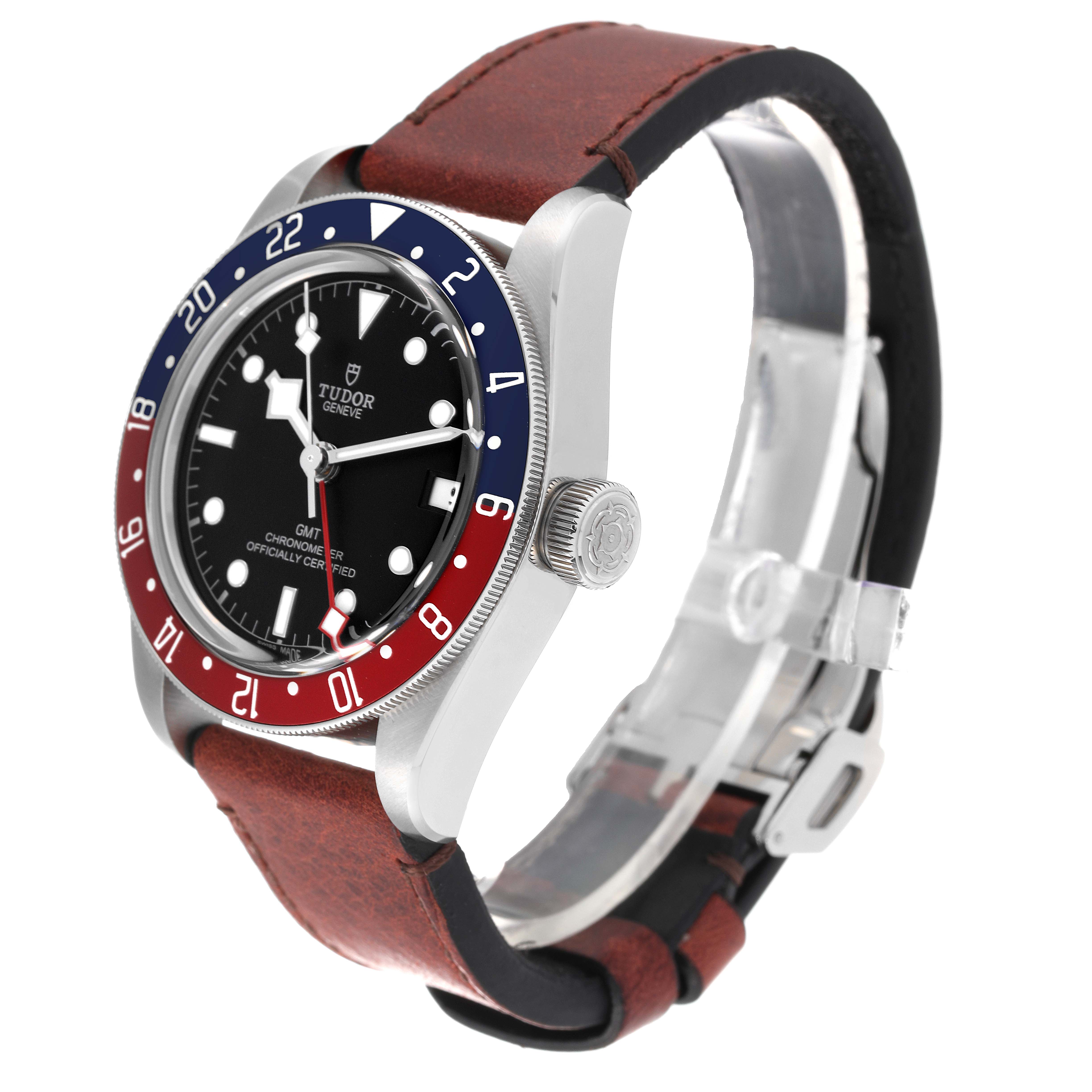 The Heritage Black Bay by Tudor is shown at a 3/4 angle, highlighting the bezel, dial, crown, and leather strap.