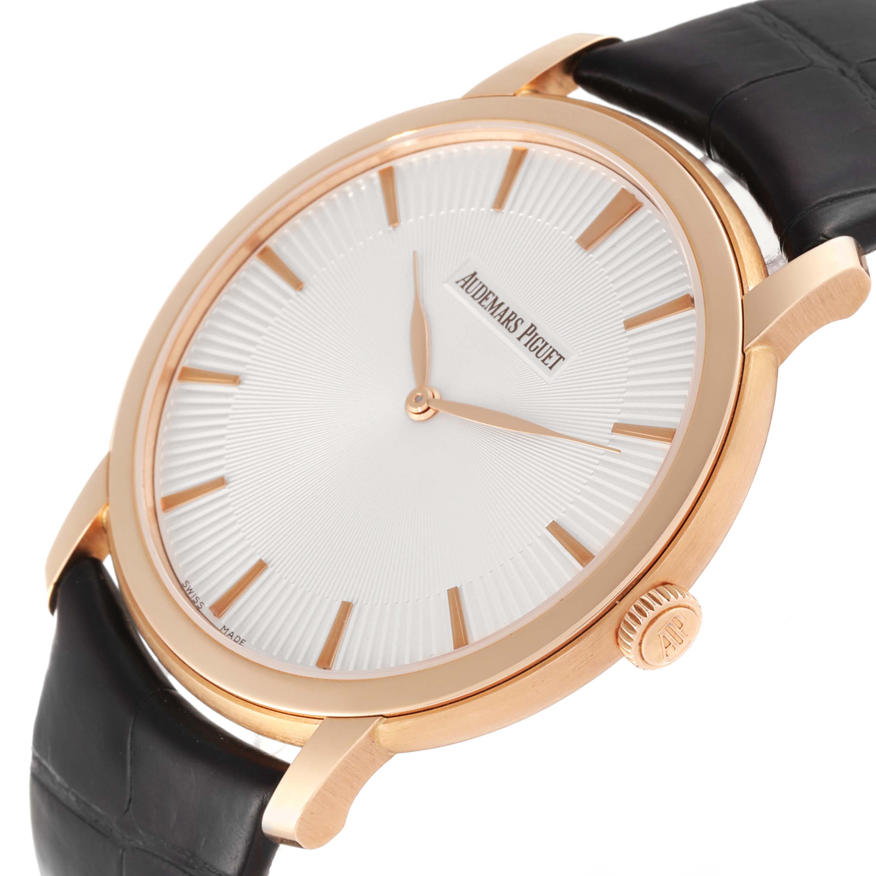 The image shows a side angle of the Jules model by Audemars Piguet, highlighting the gold case, crown, and leather strap.