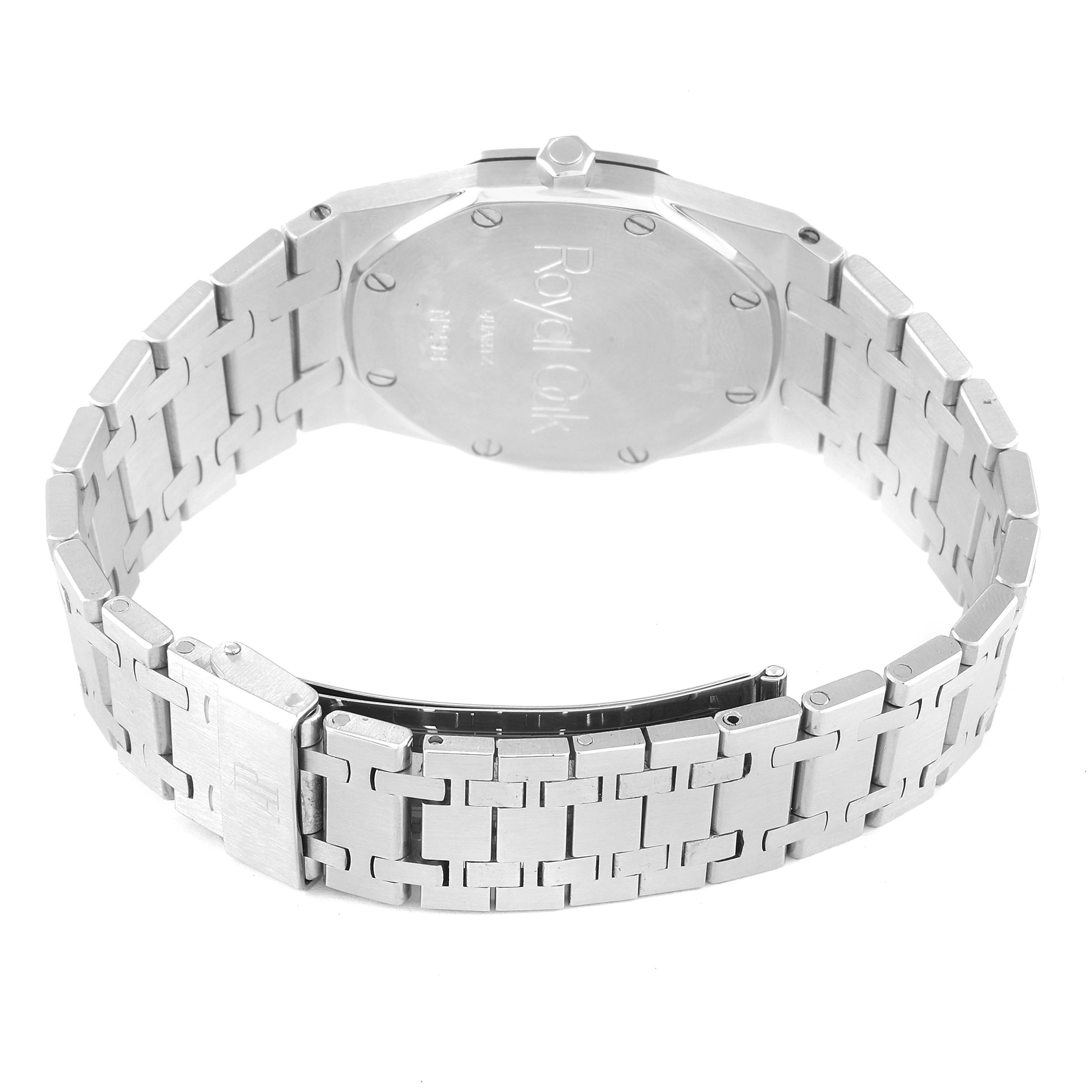 The image shows the back and bracelet of a Royal Oak watch by Audemars Piguet from a low-angle view.