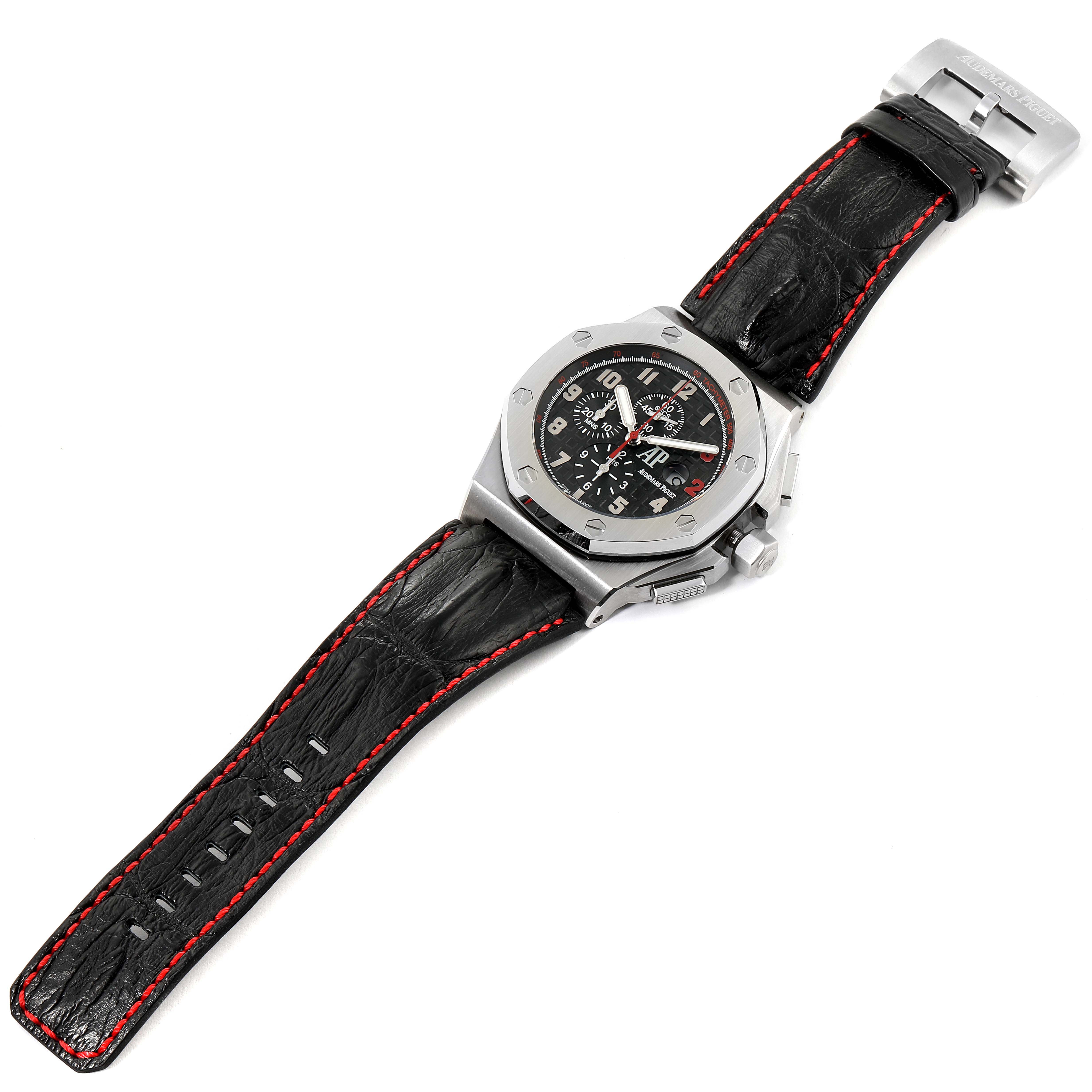 The image shows a top-down view of a Royal Oak Offshore by Audemars Piguet, featuring its dial, case, and strap.