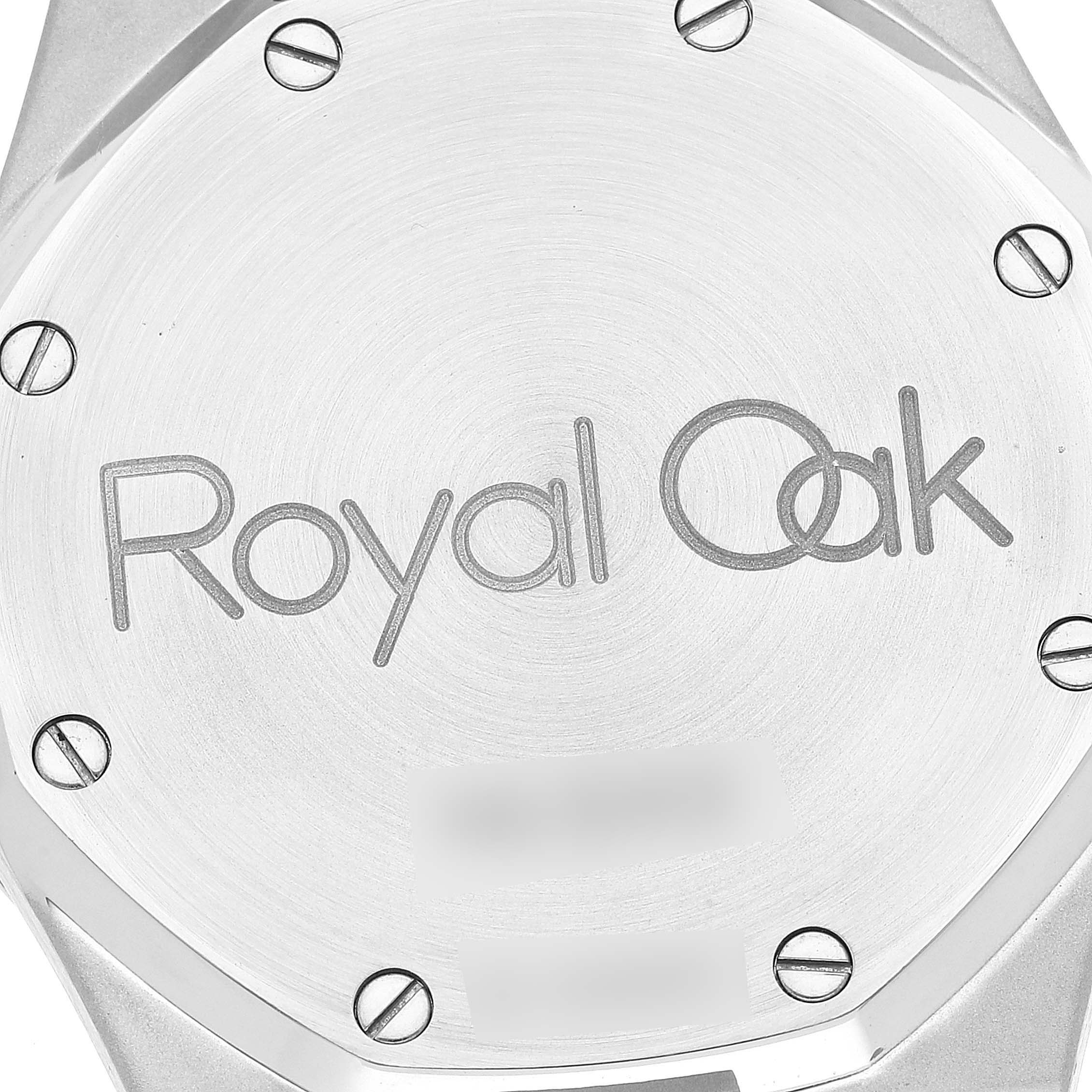 This image shows the case back of an Audemars Piguet Royal Oak 4790/789 Men's Steel and Gold (two tone) Champagne Dial 4790/789 Men's Steel and Gold (two tone) Champagne Dial watch with the engravings and screws visible.