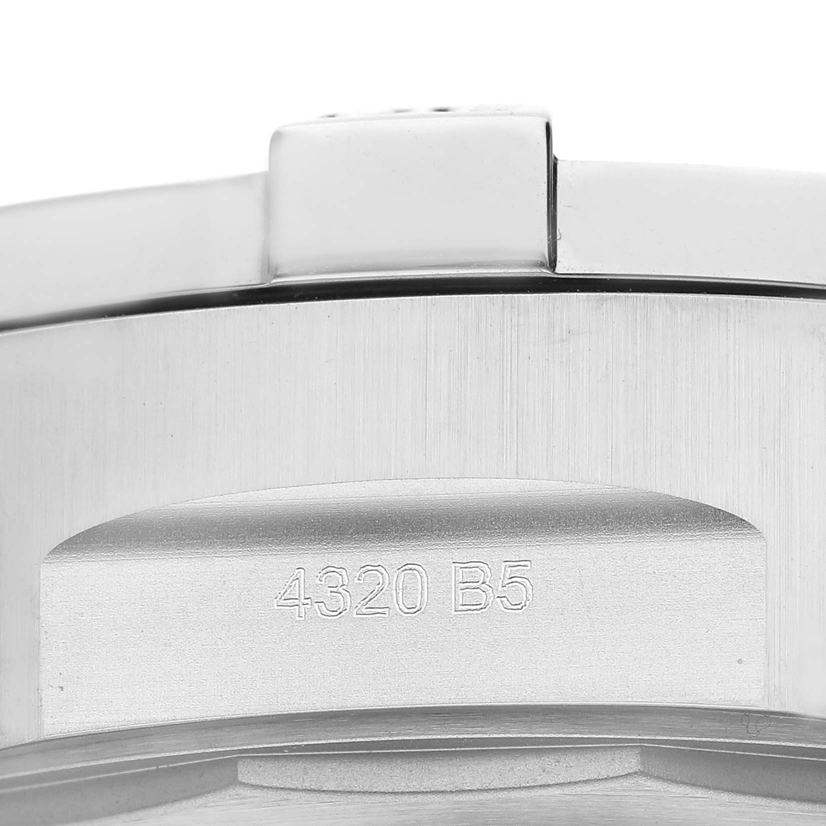 The image shows a close-up of the side of a Breitling Avenger A13385 Men's Stainless Steel Blue Dial A13385 Men's Stainless Steel Blue Dial watch, specifically highlighting the engraved model number "4320 B5".