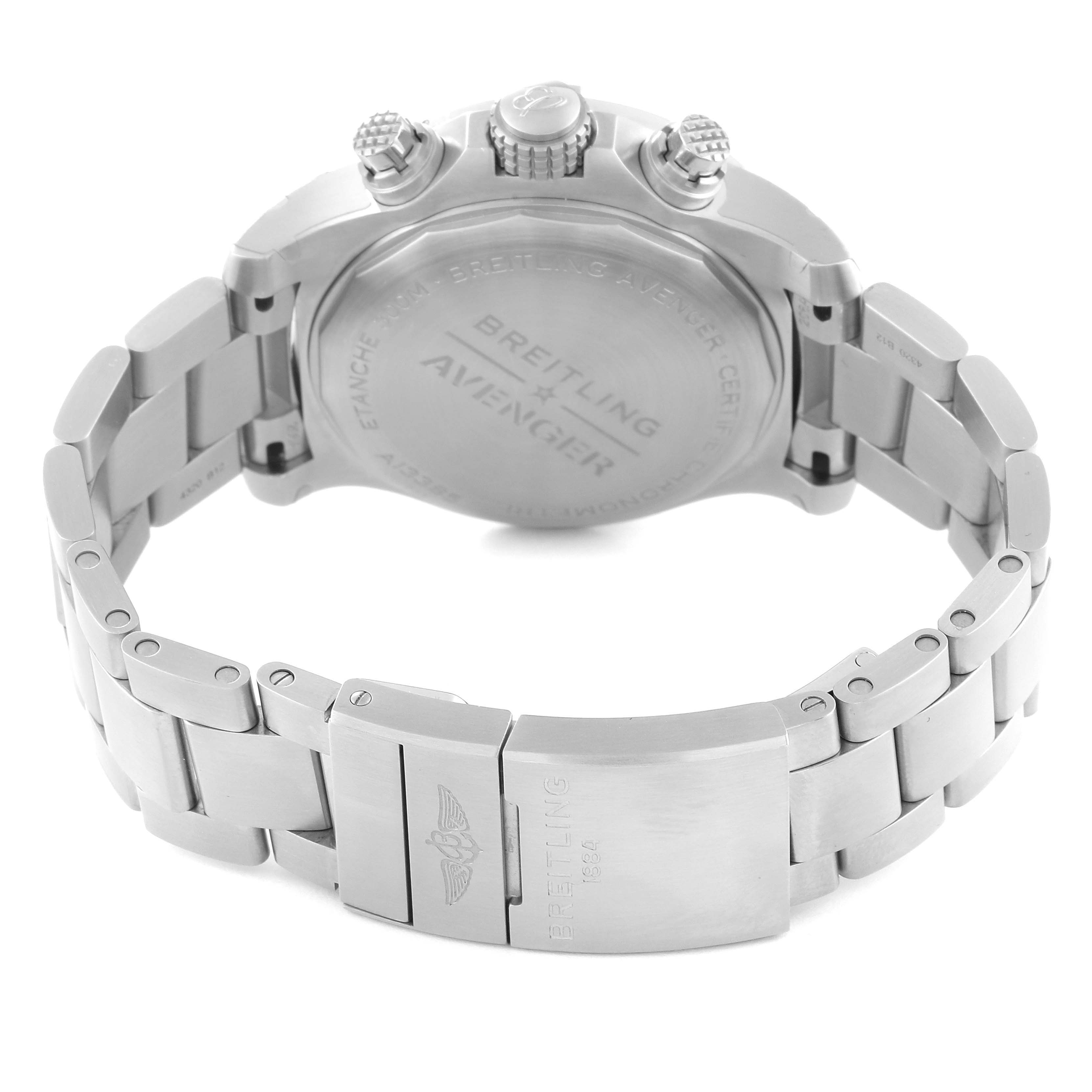 The image shows the Breitling Avenger A13385 Men's Stainless Steel Blue Dial A13385 Men's Stainless Steel Blue Dial watch from the back, highlighting the case back, crown, pushers, and metal bracelet.
