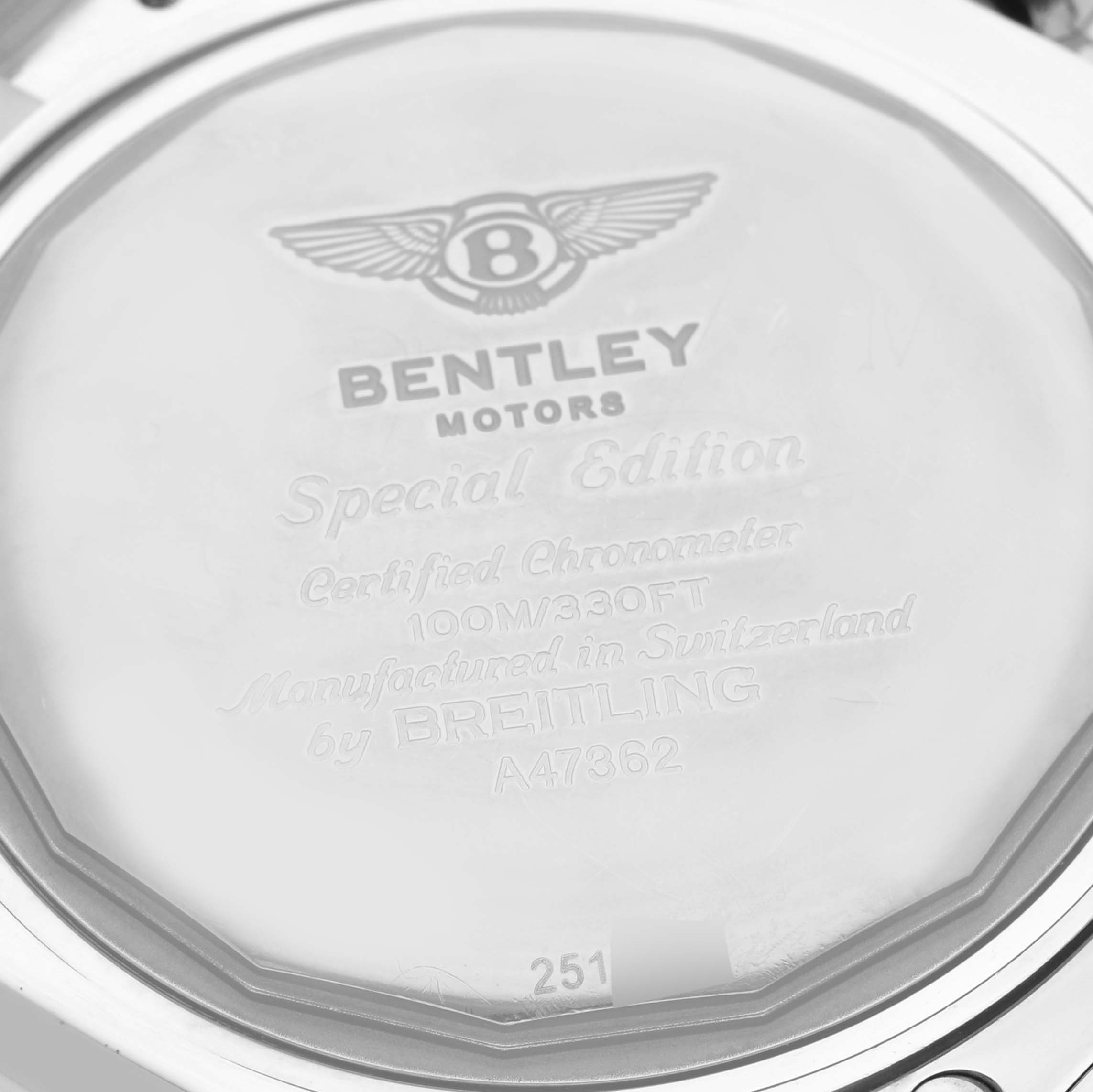 The image shows the back case of the Bentley model by Breitling, highlighting engravings and specifications.