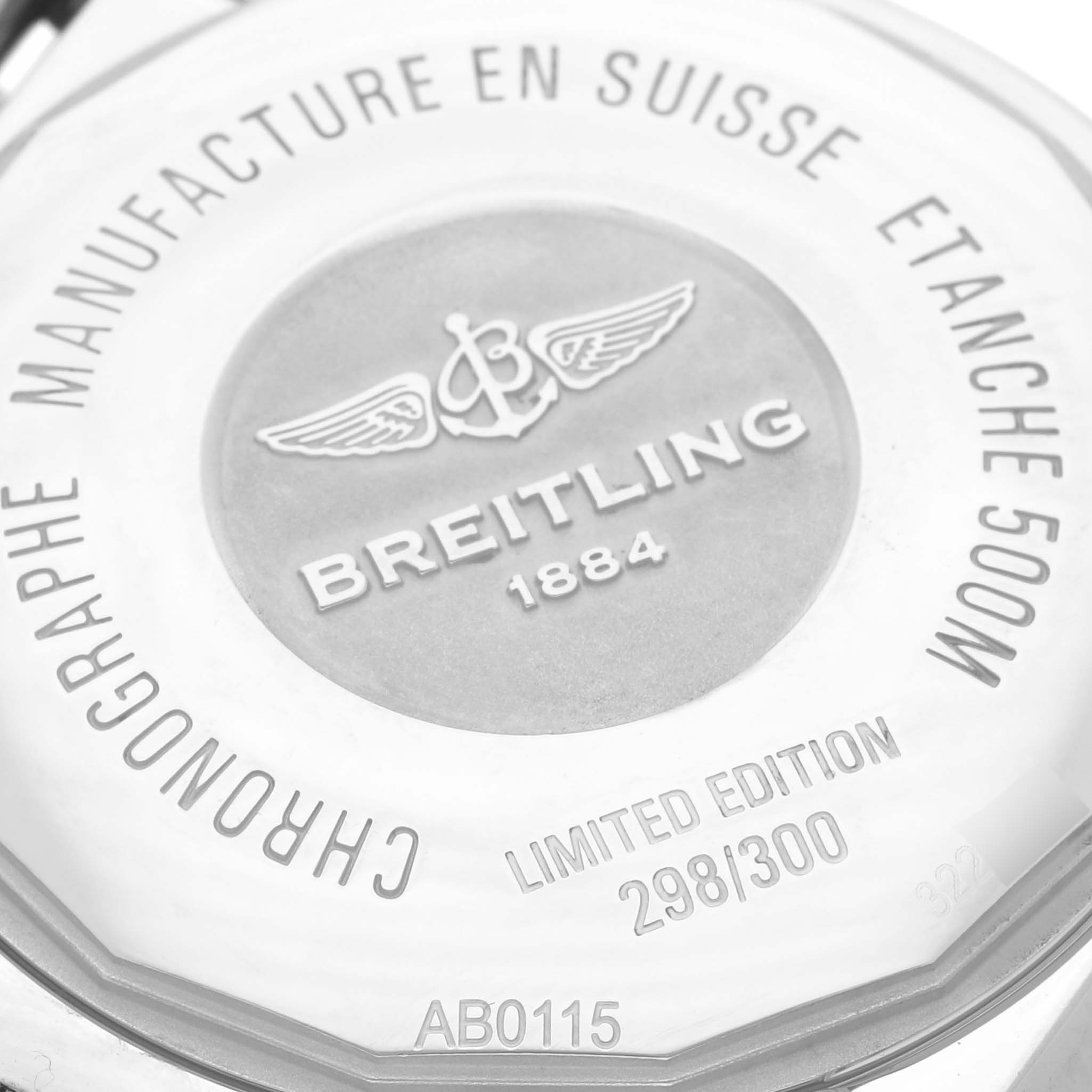The image shows the back case of a Breitling Chronomat AB011511/F577 Men's Stainless Steel Grey Dial AB011511/F577 Men's Stainless Steel Grey Dial, highlighting engravings and details like water resistance and limited edition number.